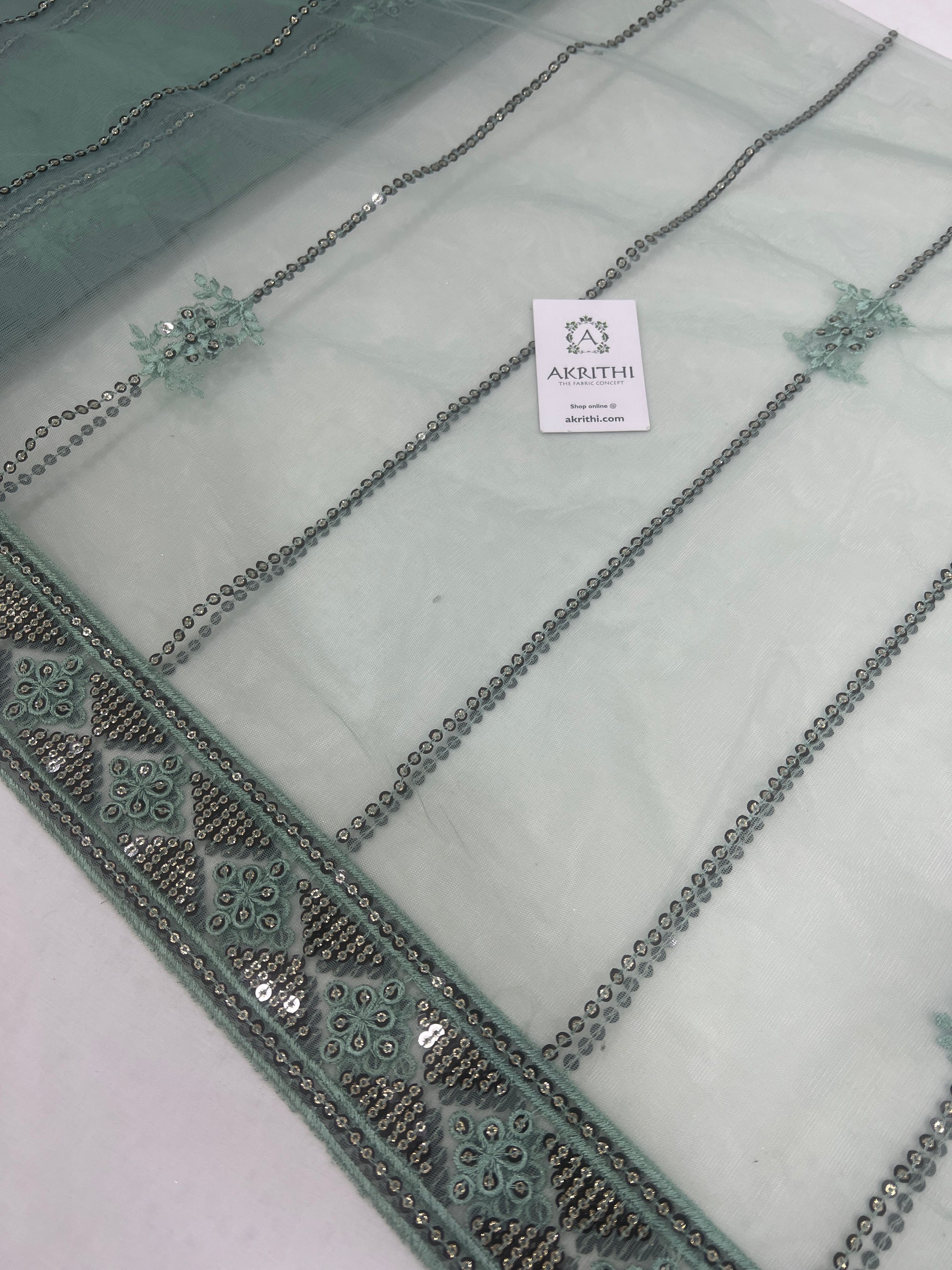 Embroidered net fabric