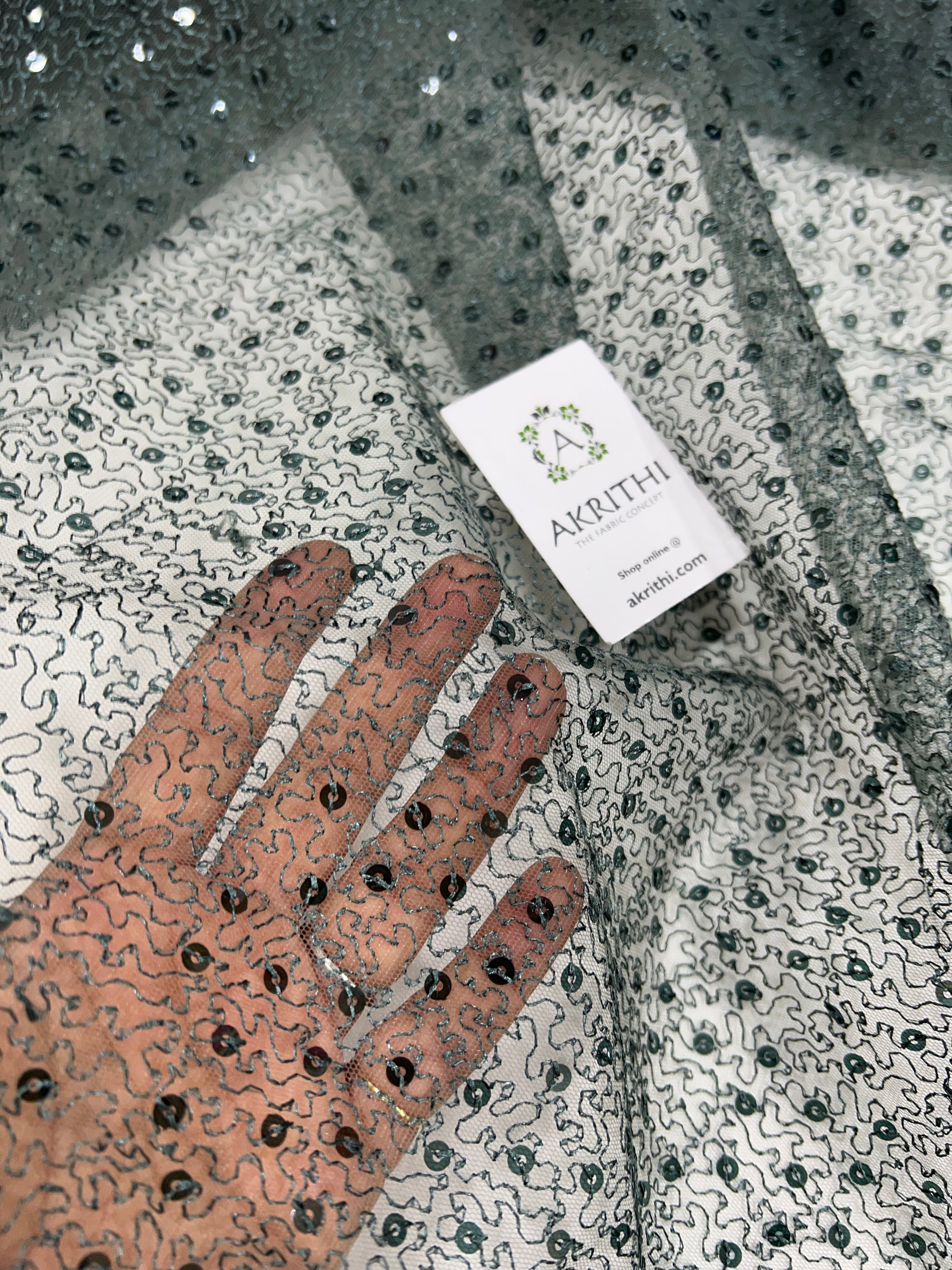 Self Embroidered net fabric