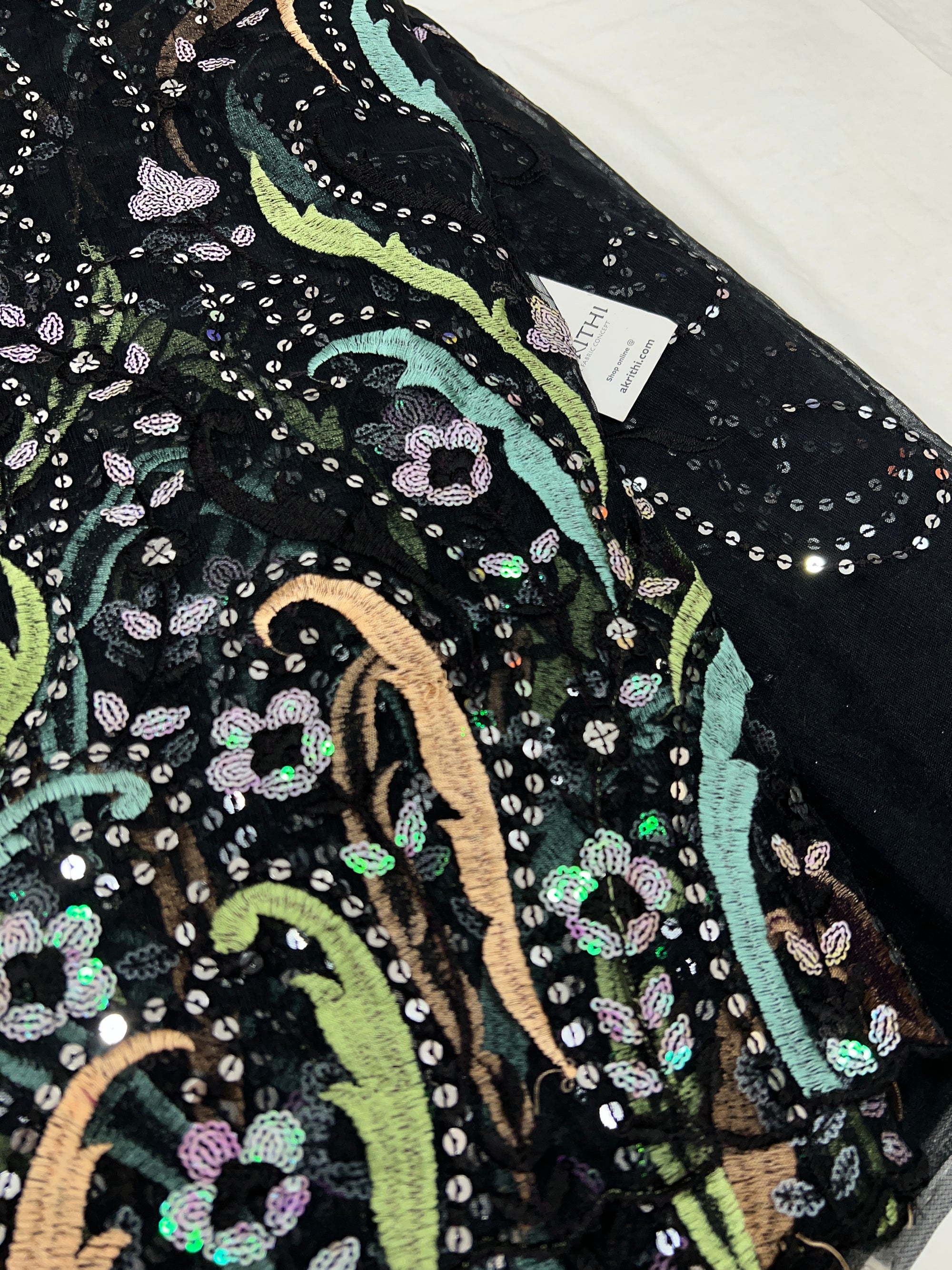 Embroidered net fabric