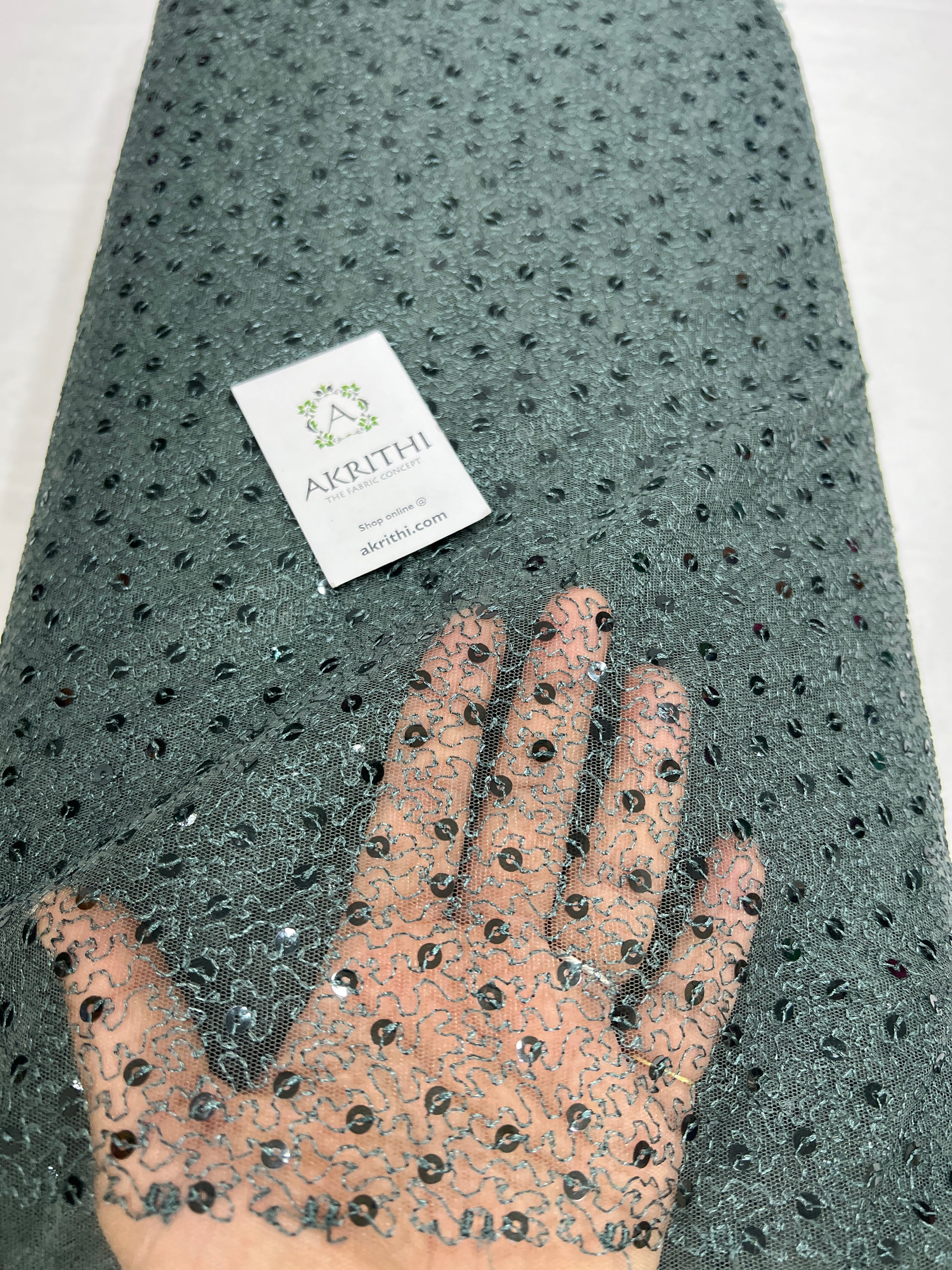 Self Embroidered net fabric