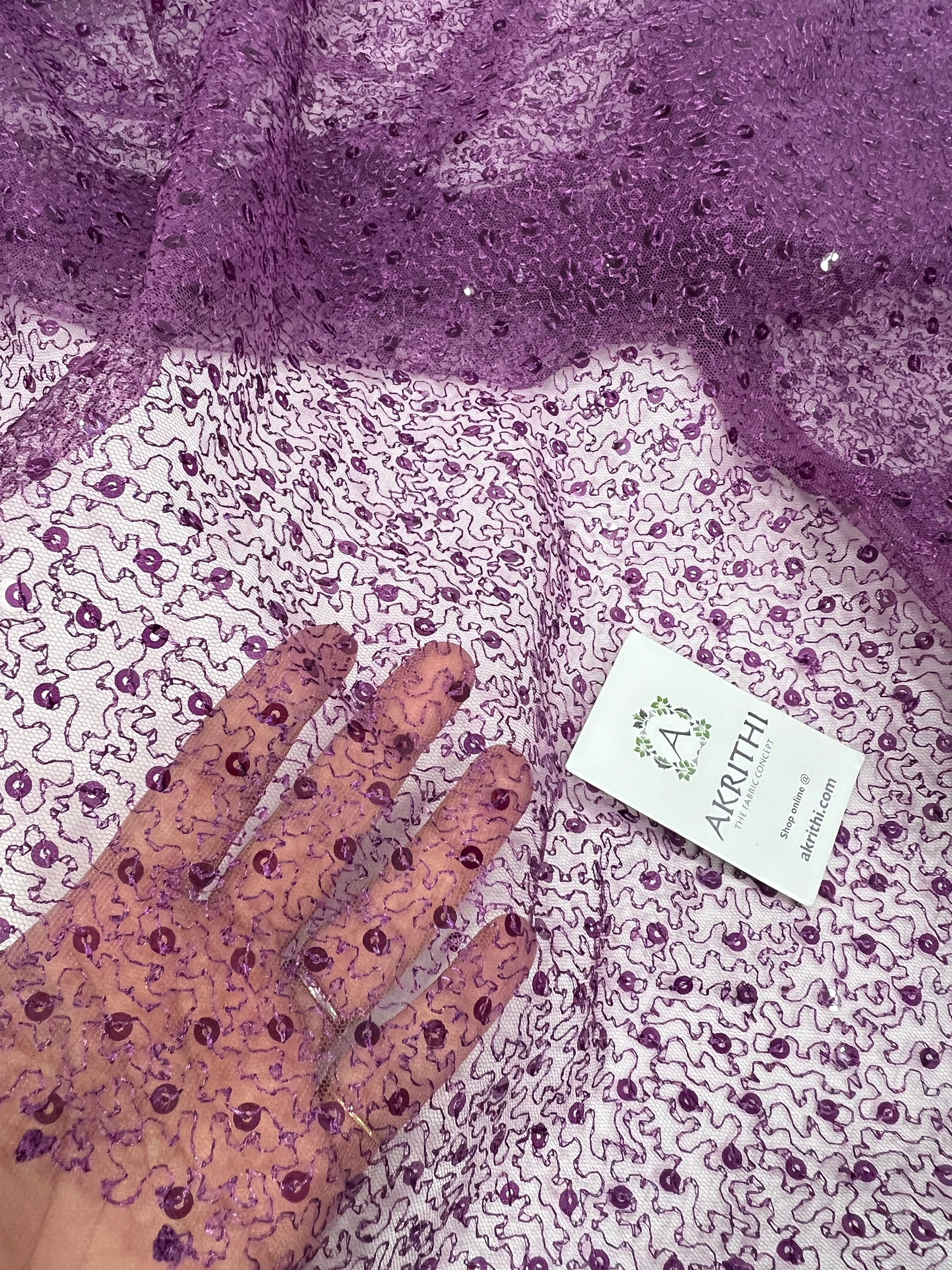 Self Embroidered net fabric