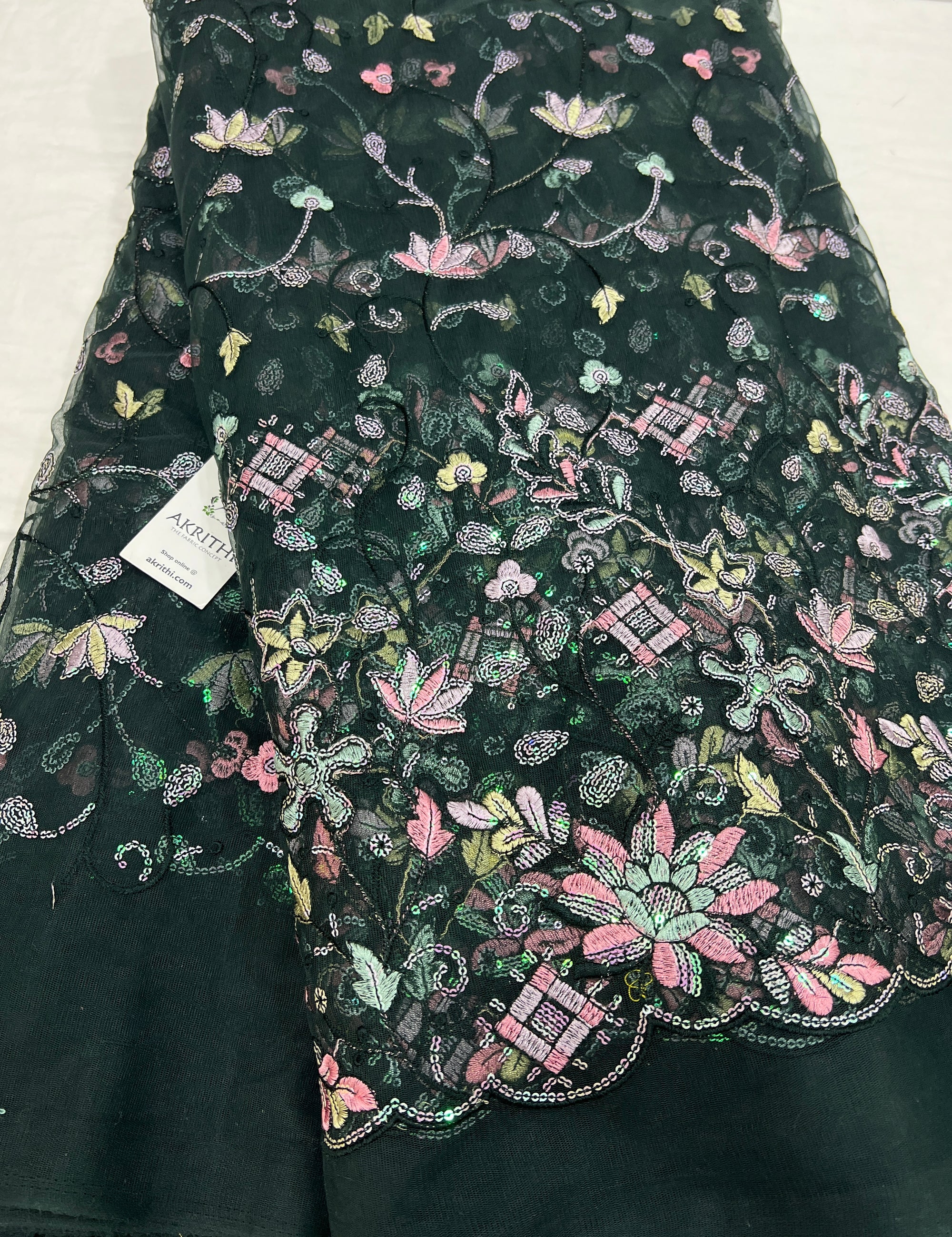 Embroidered net fabric