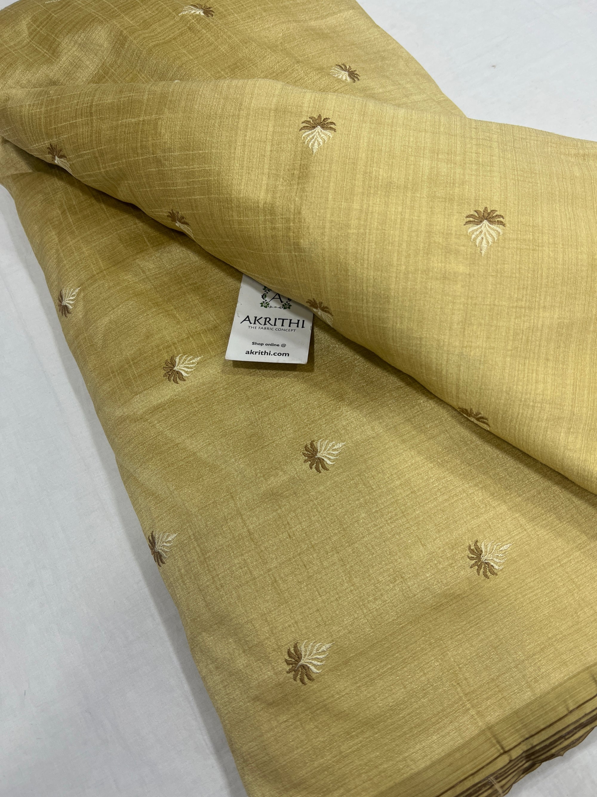 Embroidered raw silk fabric