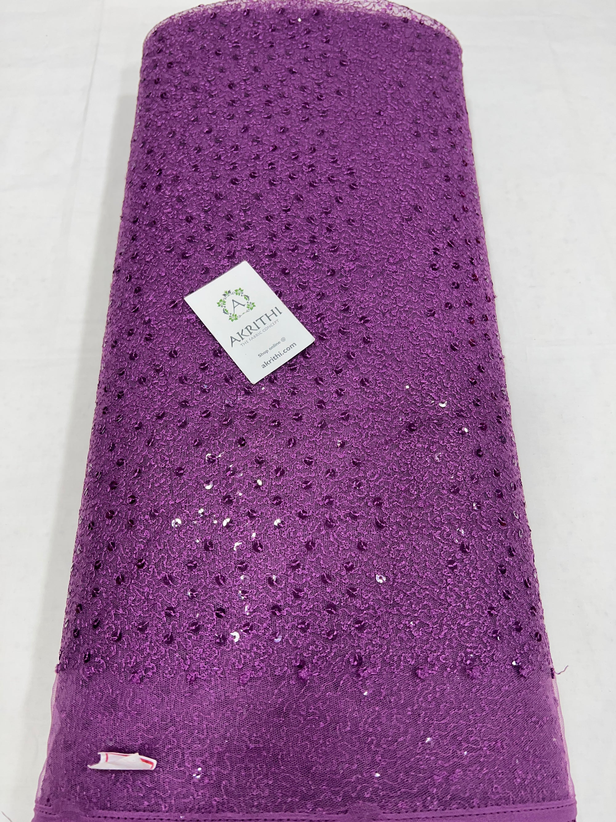 Self Embroidered net fabric