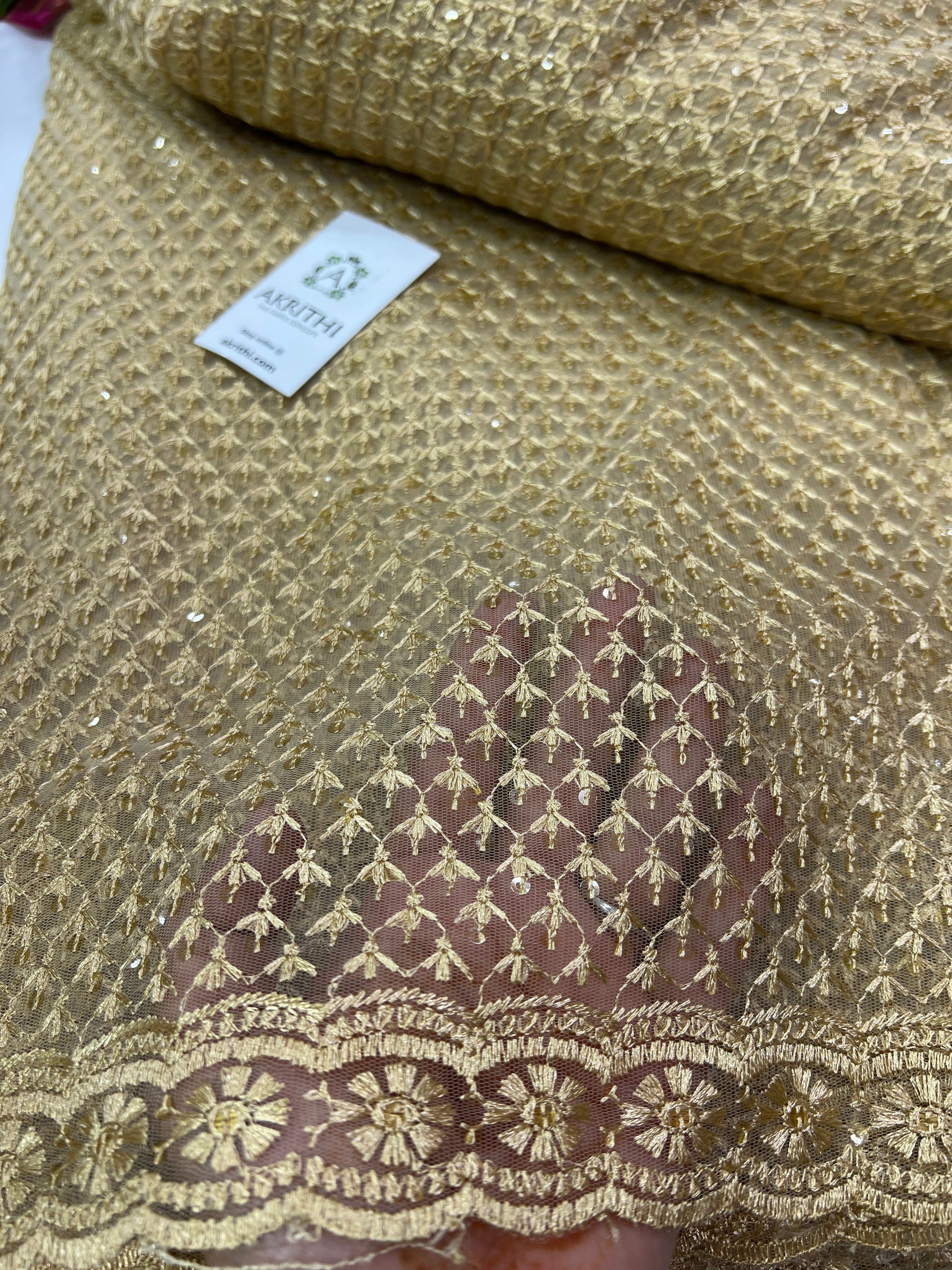 Embroidery on net fabric