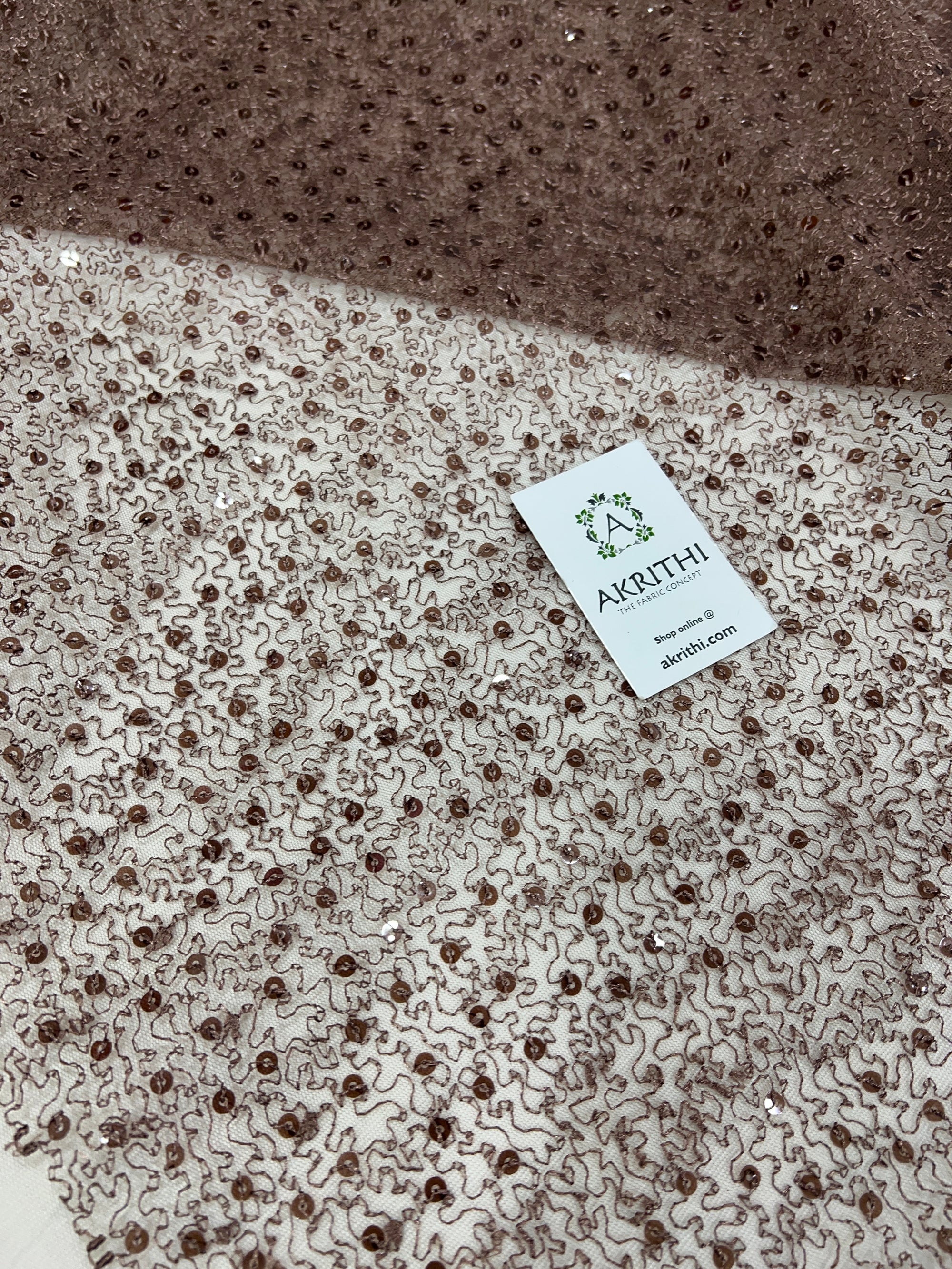 Self Embroidered net fabric