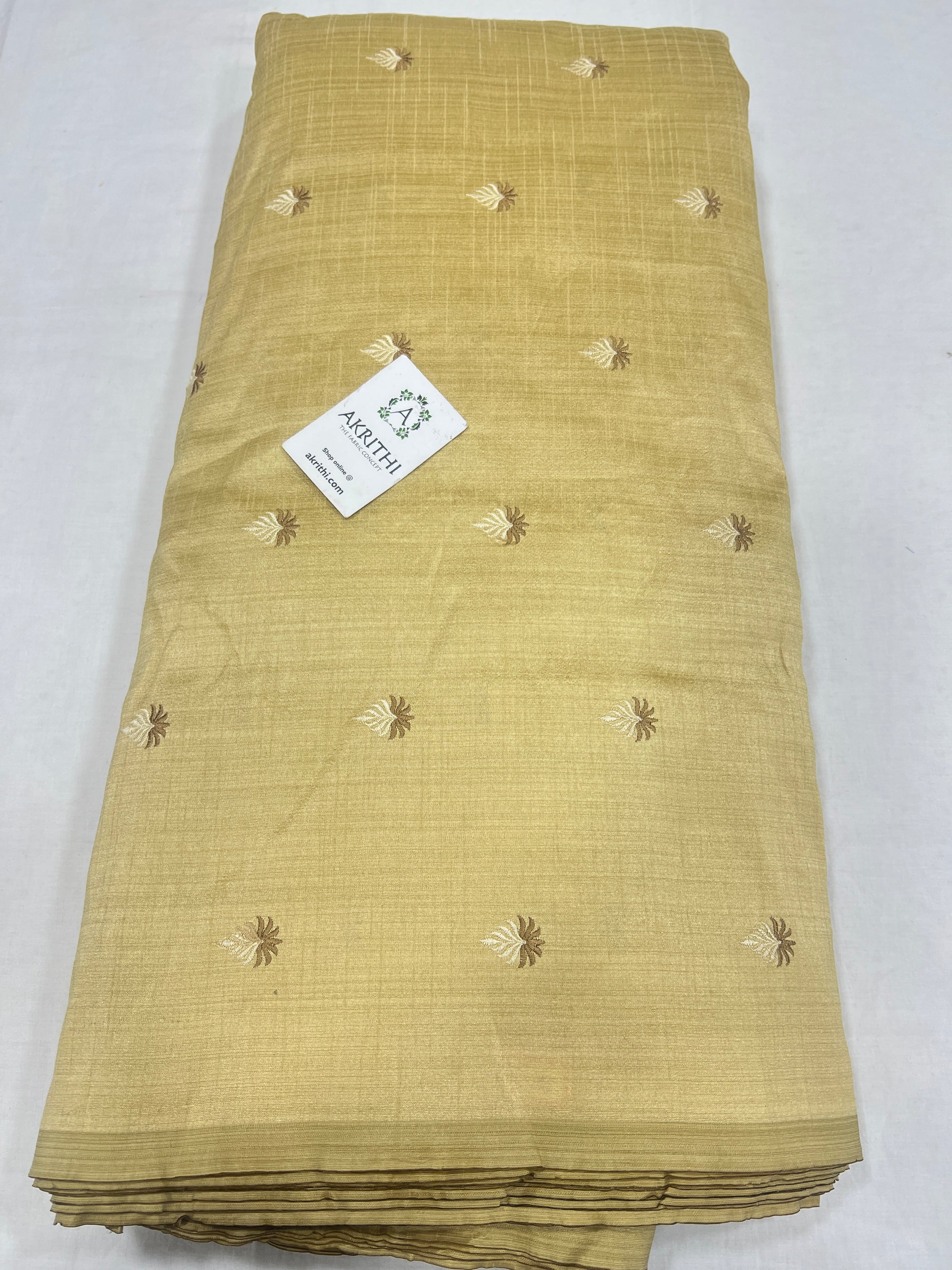 Embroidered raw silk fabric