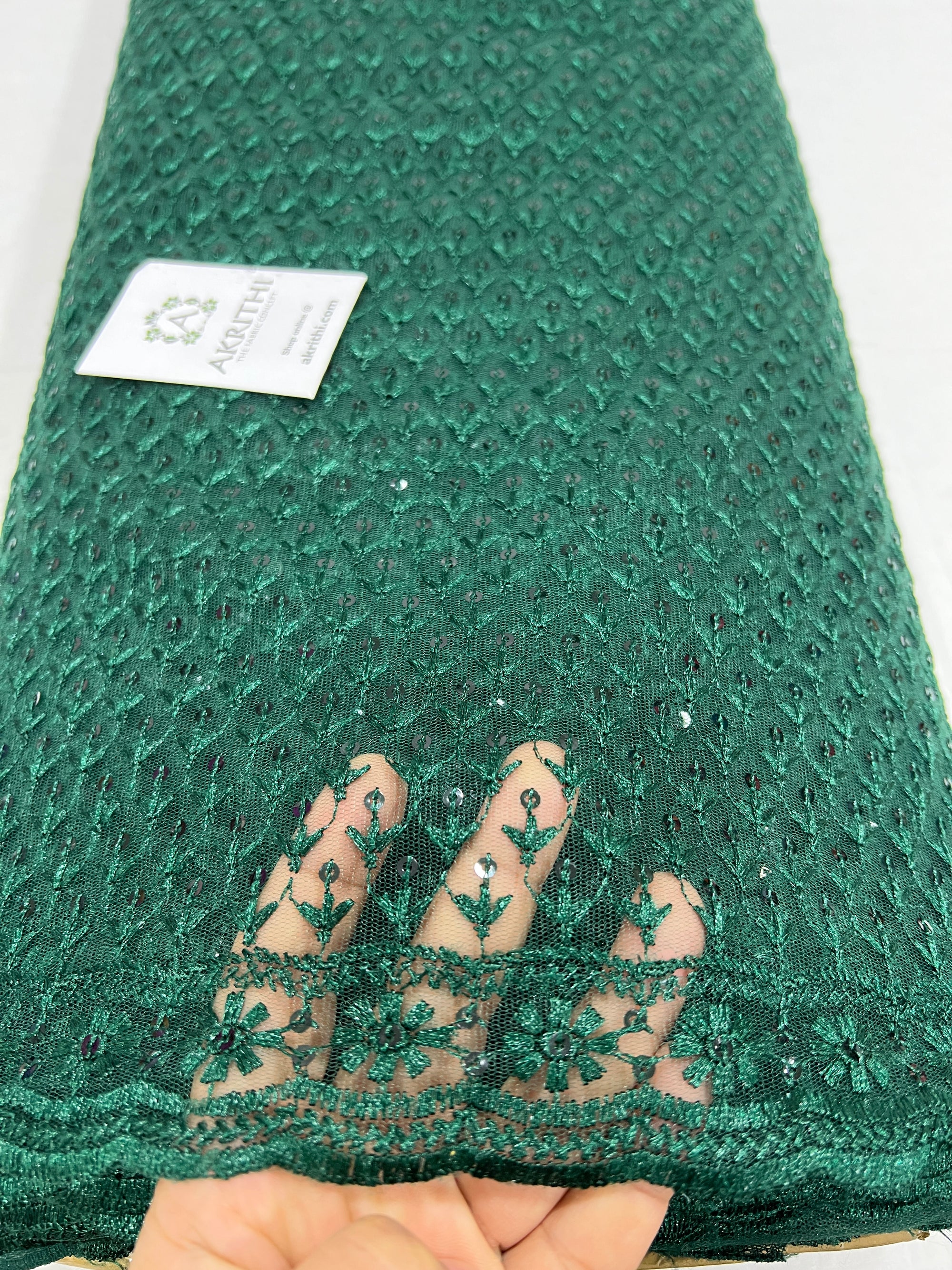 Self Embroidered net fabric