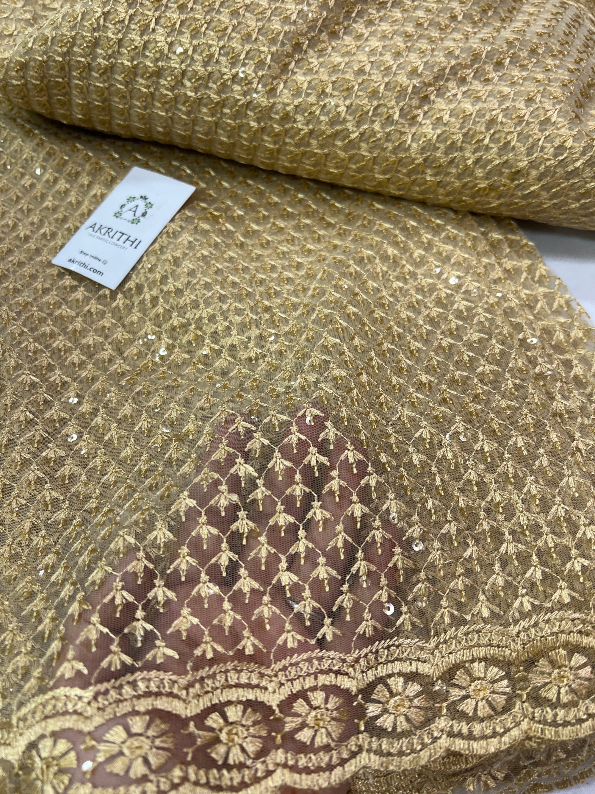 Embroidery on net fabric