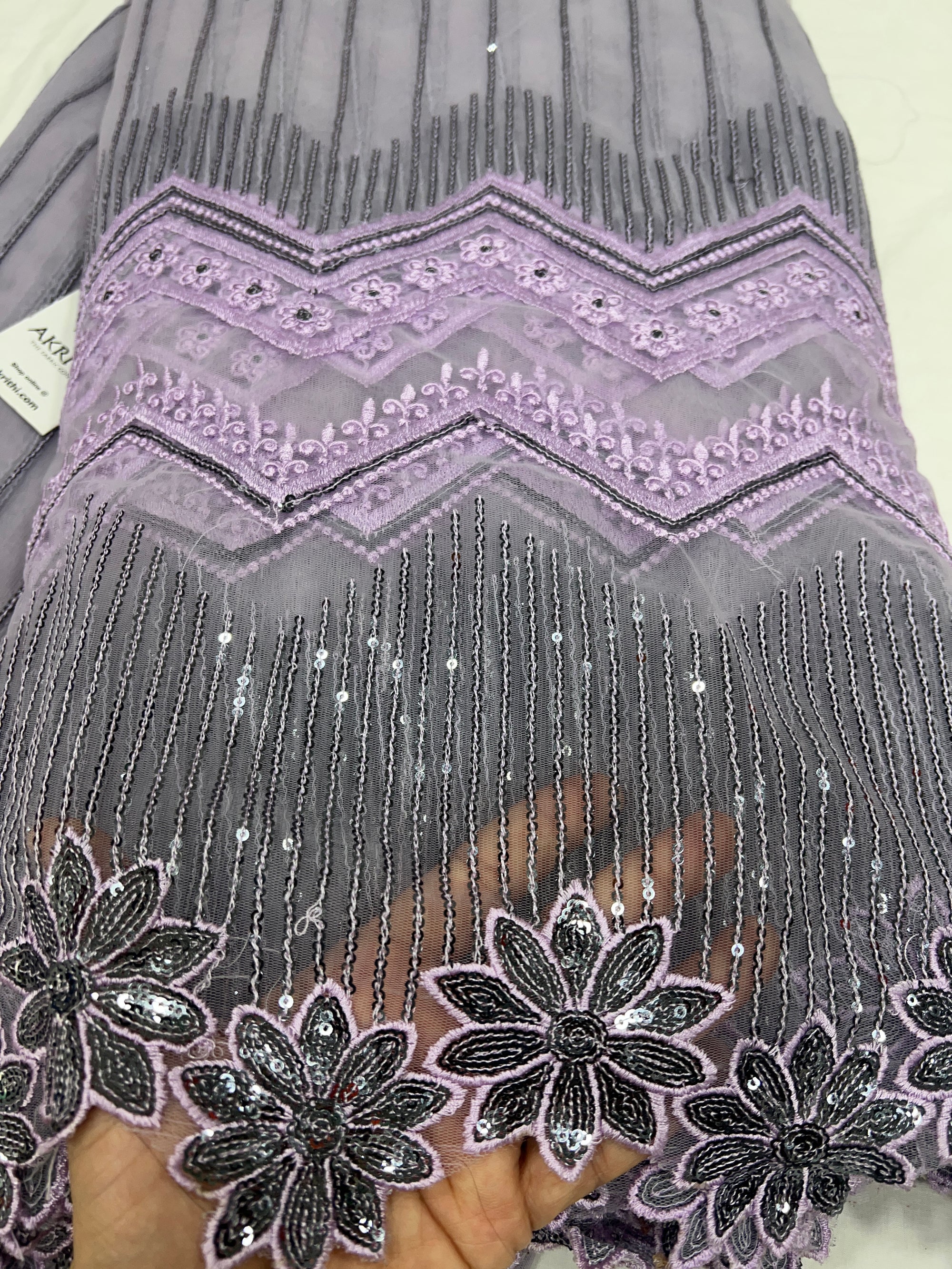 Embroidered net fabric