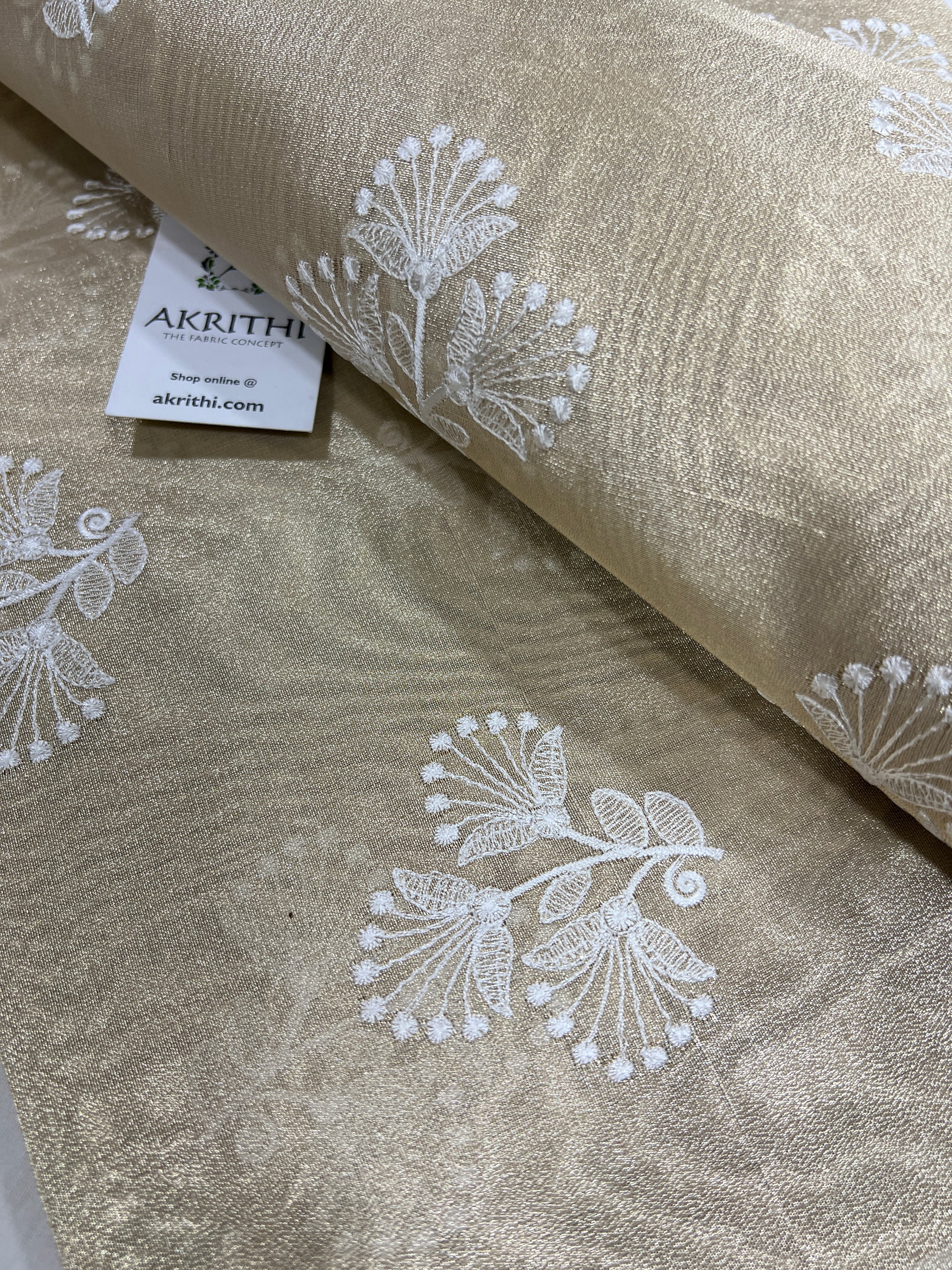 Embroidery on tissue fabric