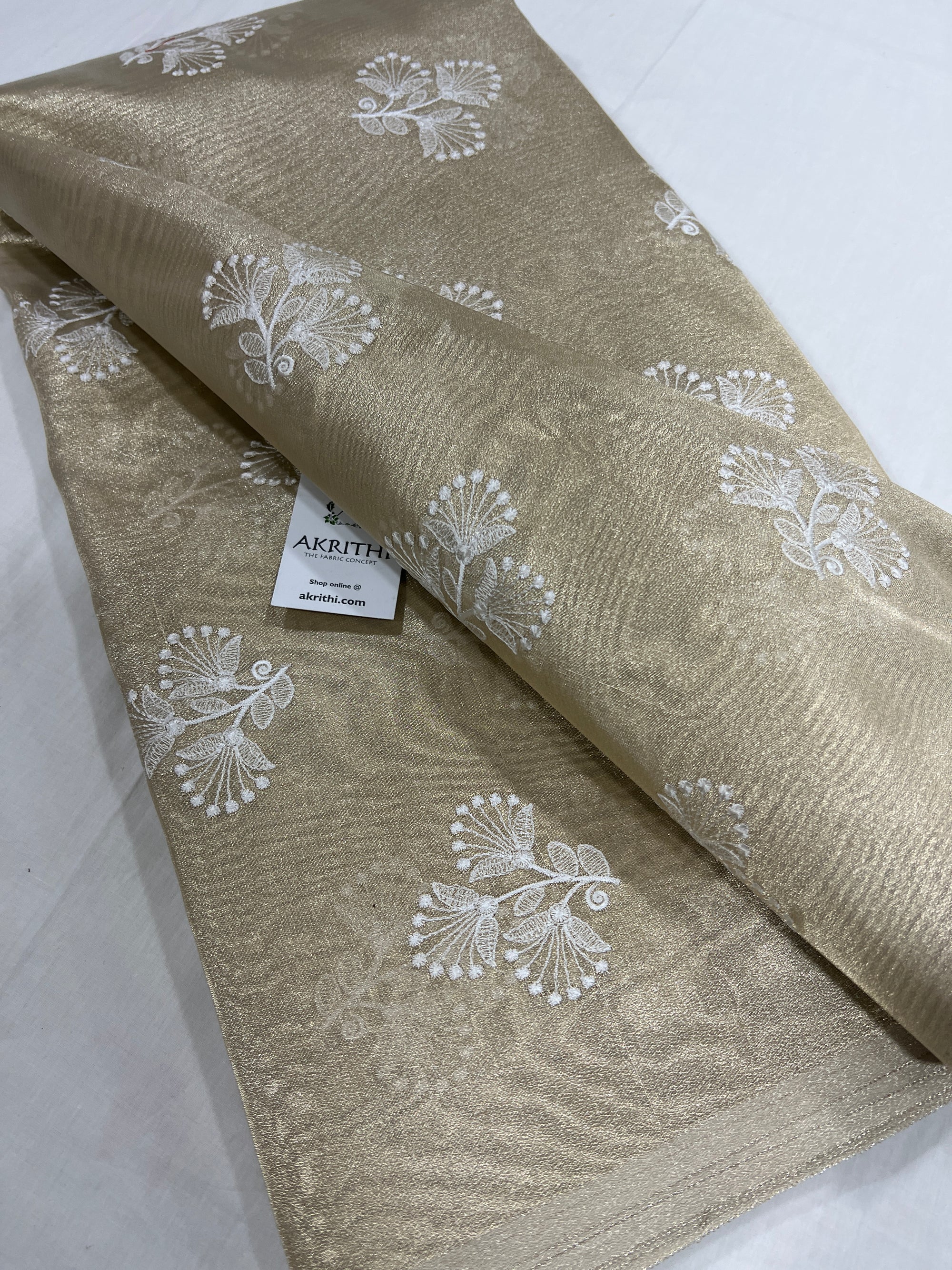 Embroidery on tissue fabric