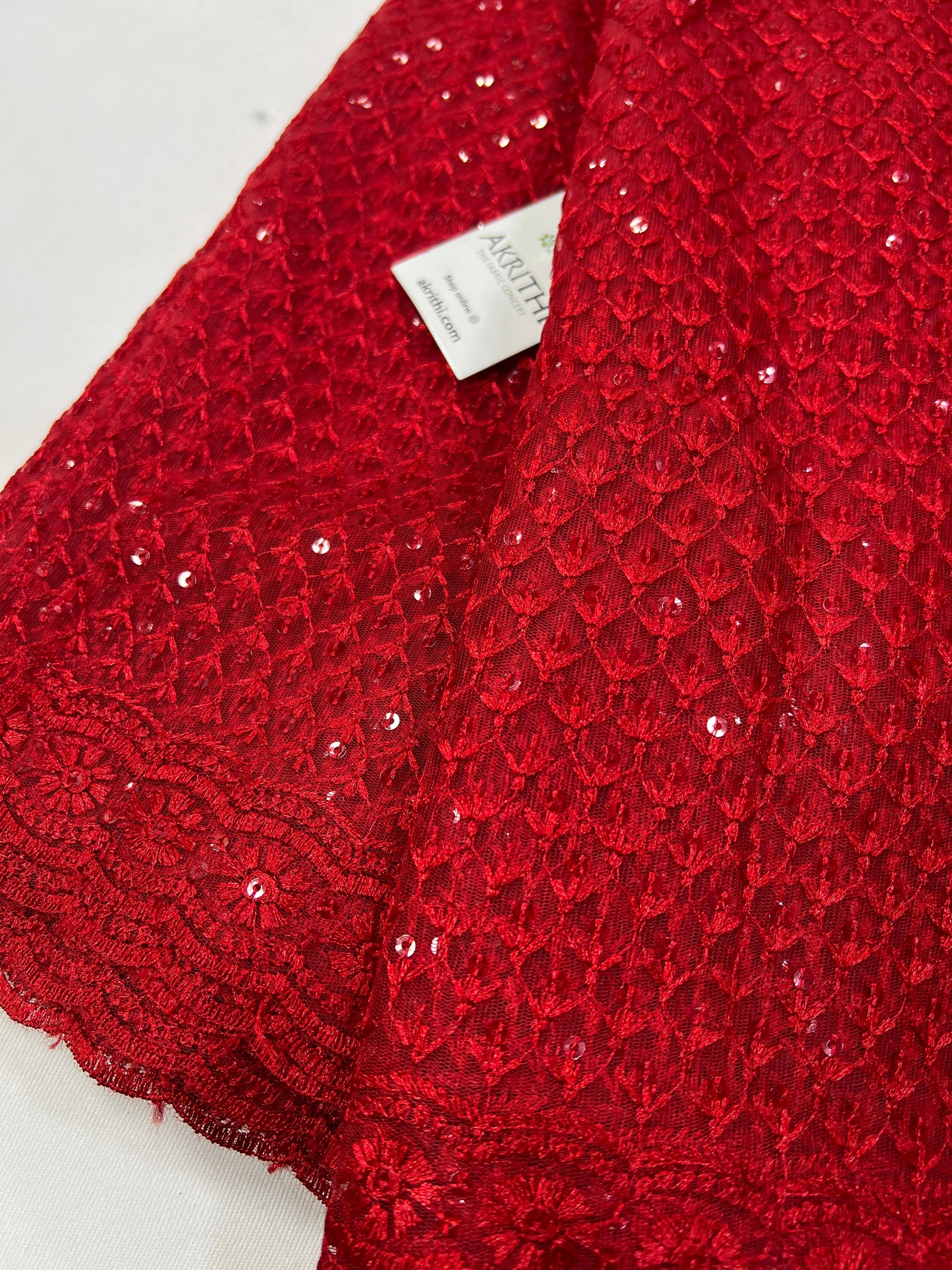 Embroidery on net fabric