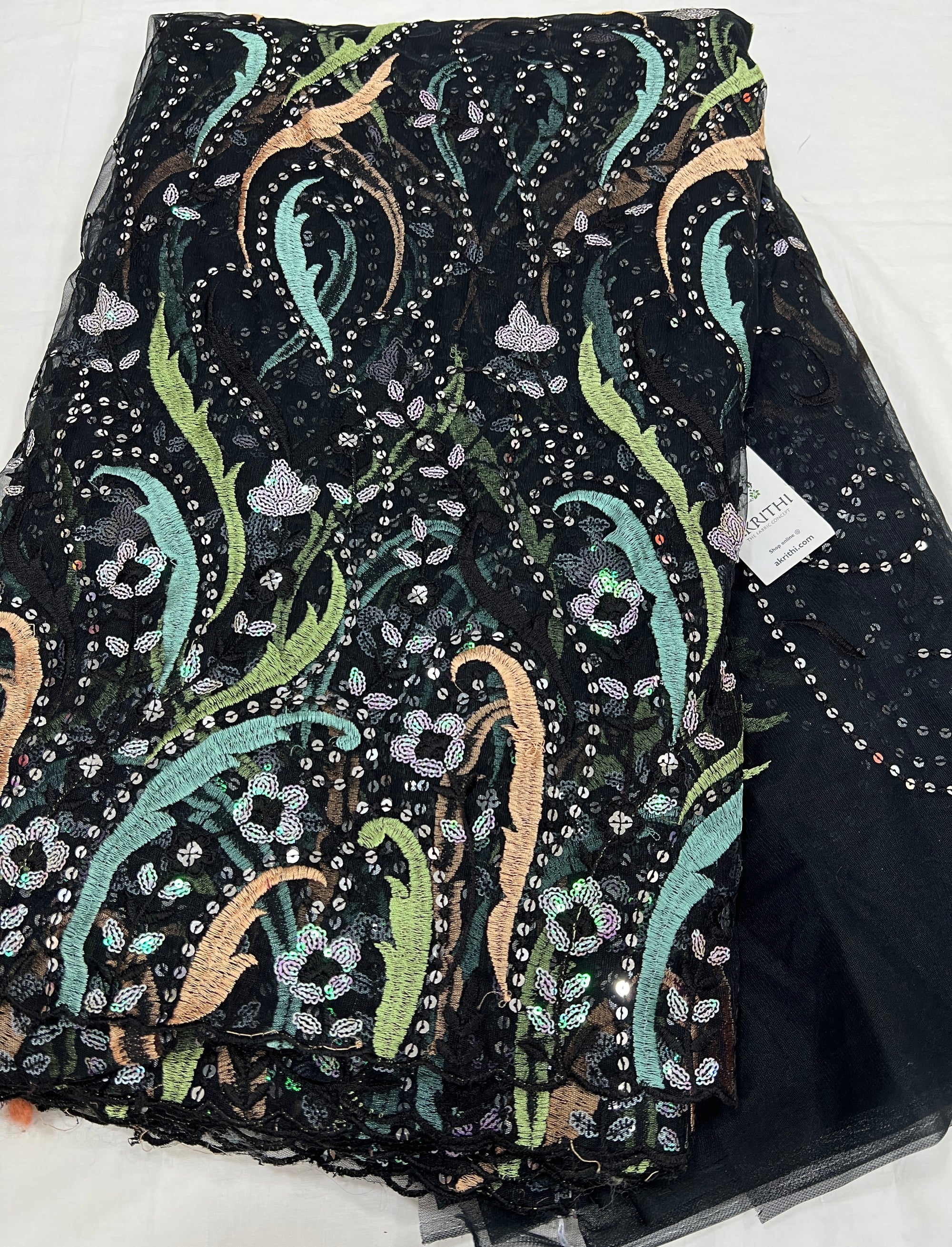 Embroidered net fabric