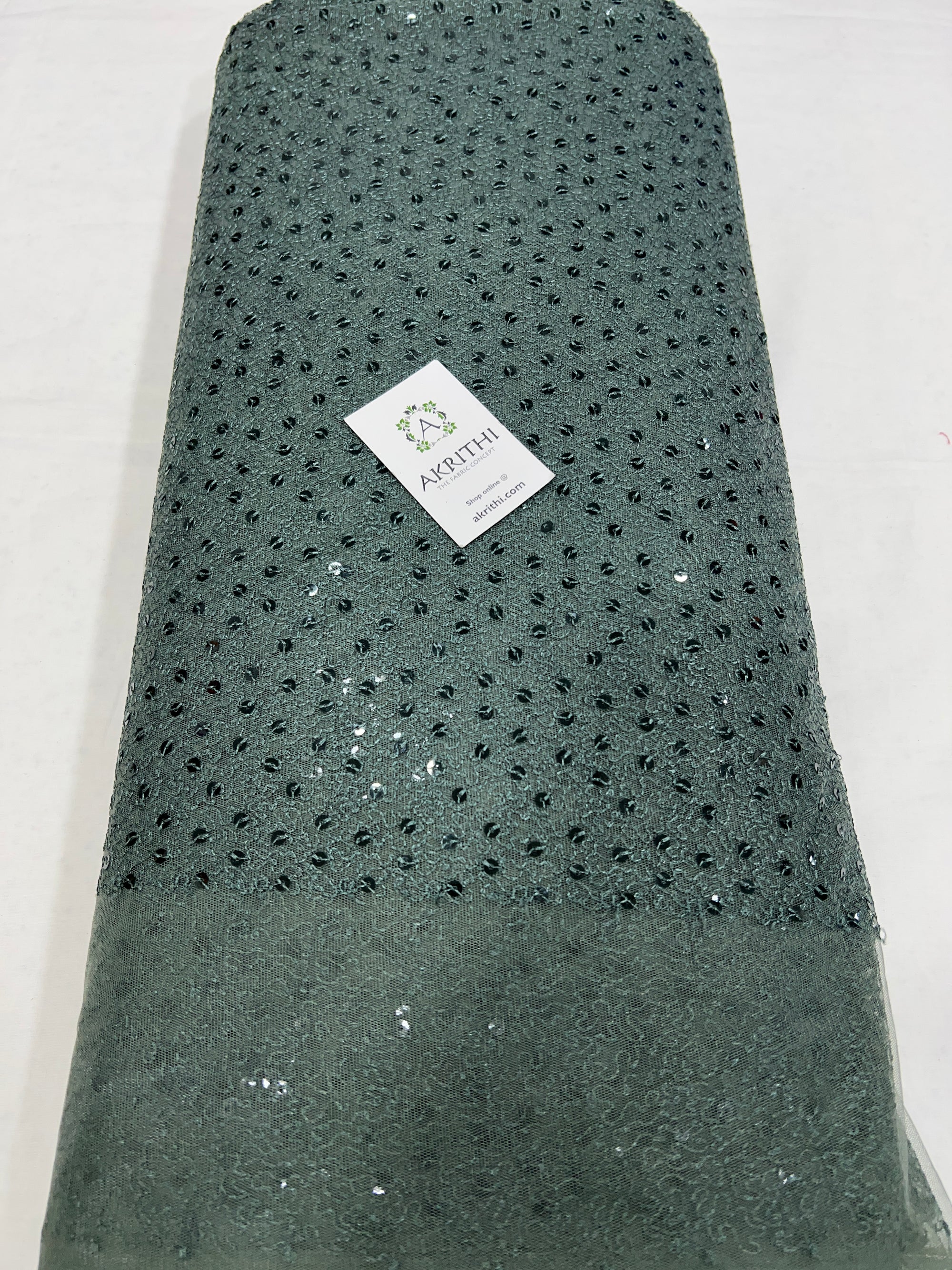 Self Embroidered net fabric