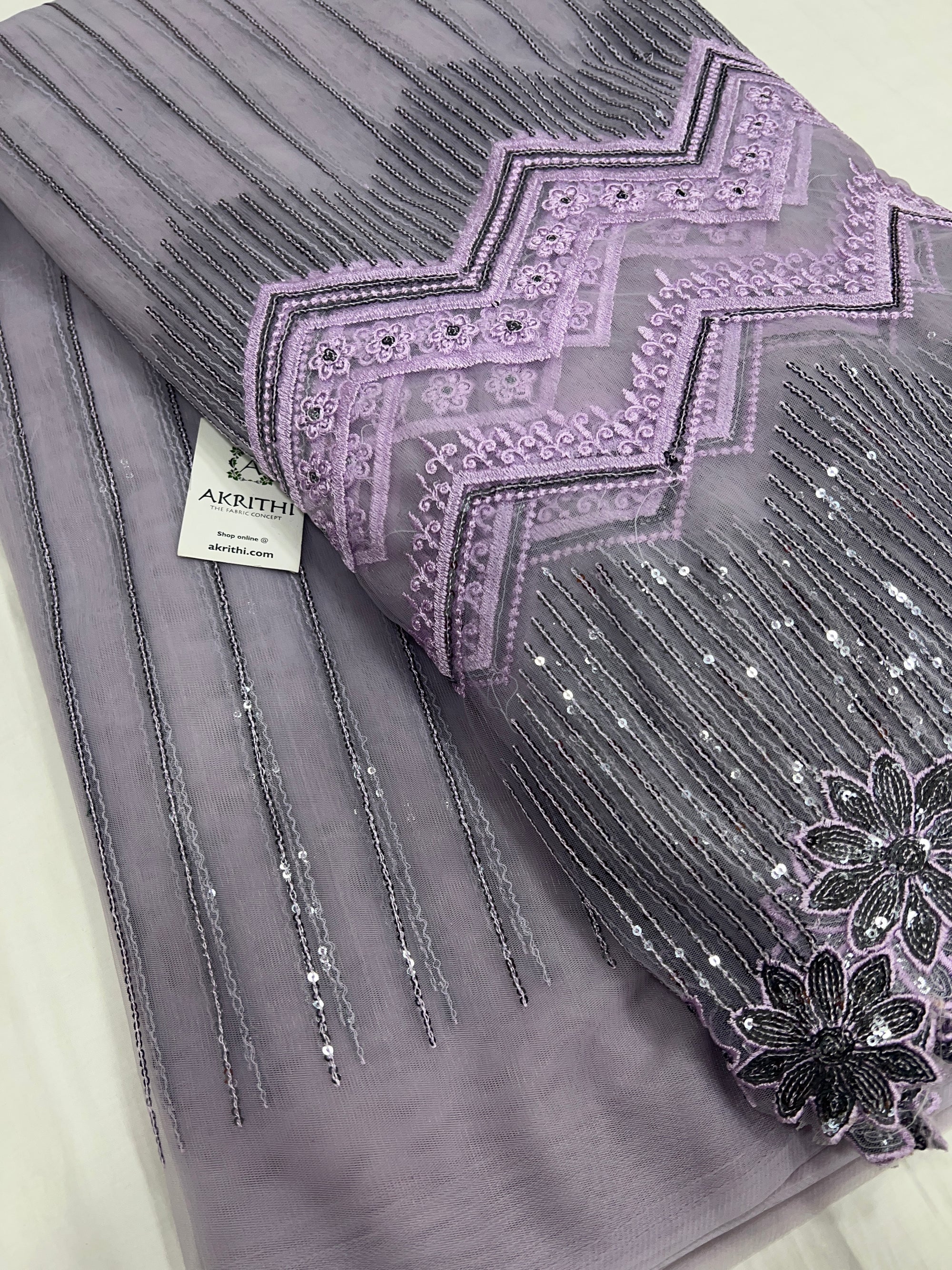Embroidered net fabric