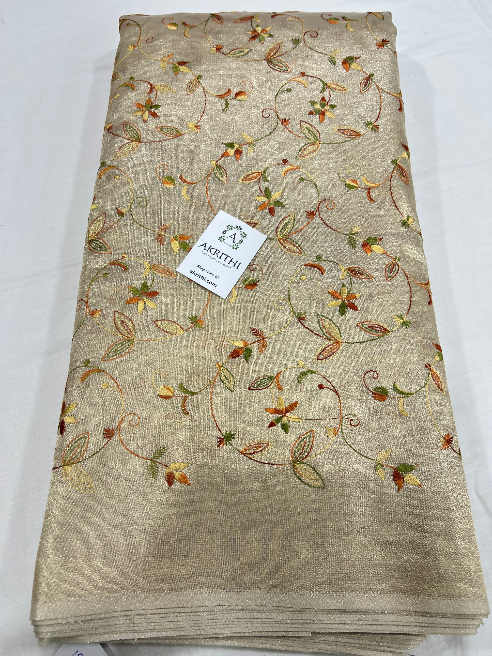 Embroidery on tissue fabric