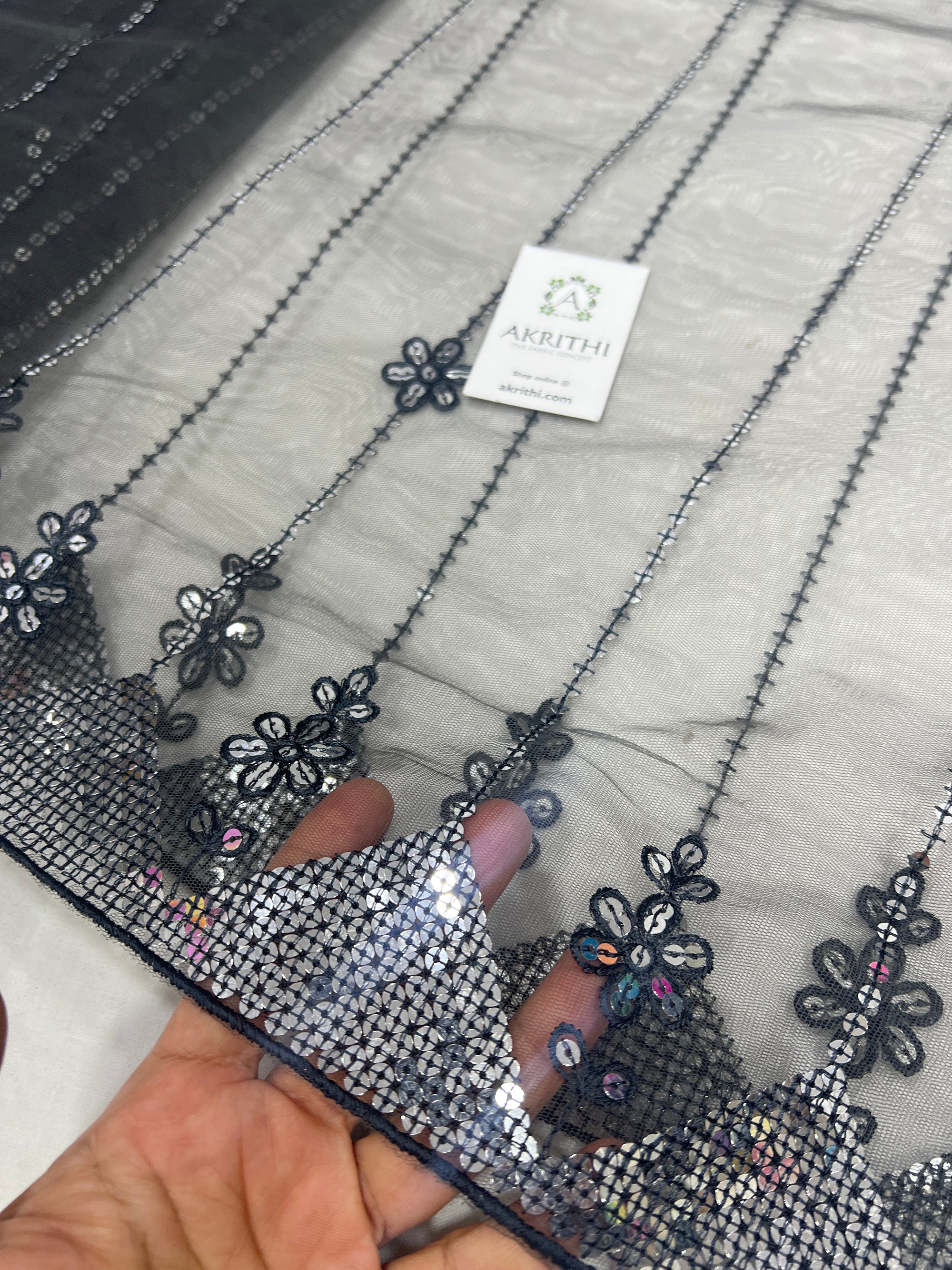 Embroidered net fabric