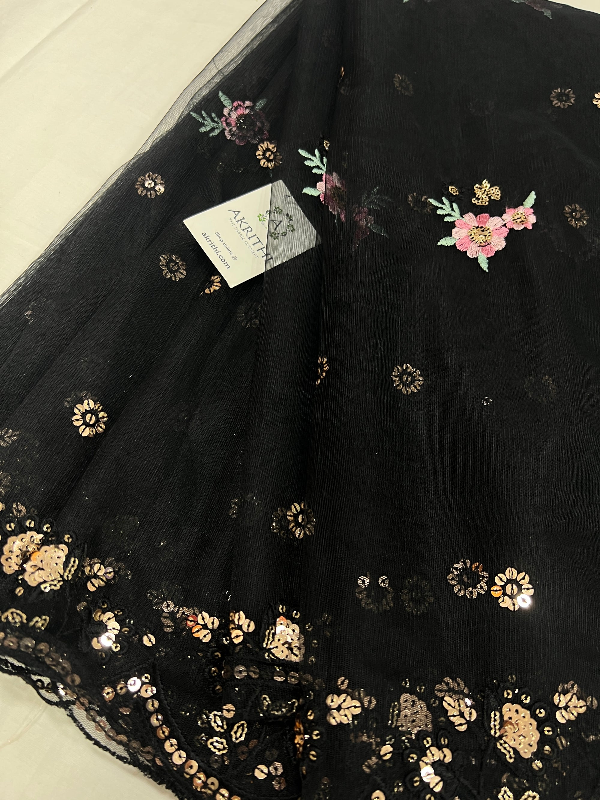 Embroidered net fabric