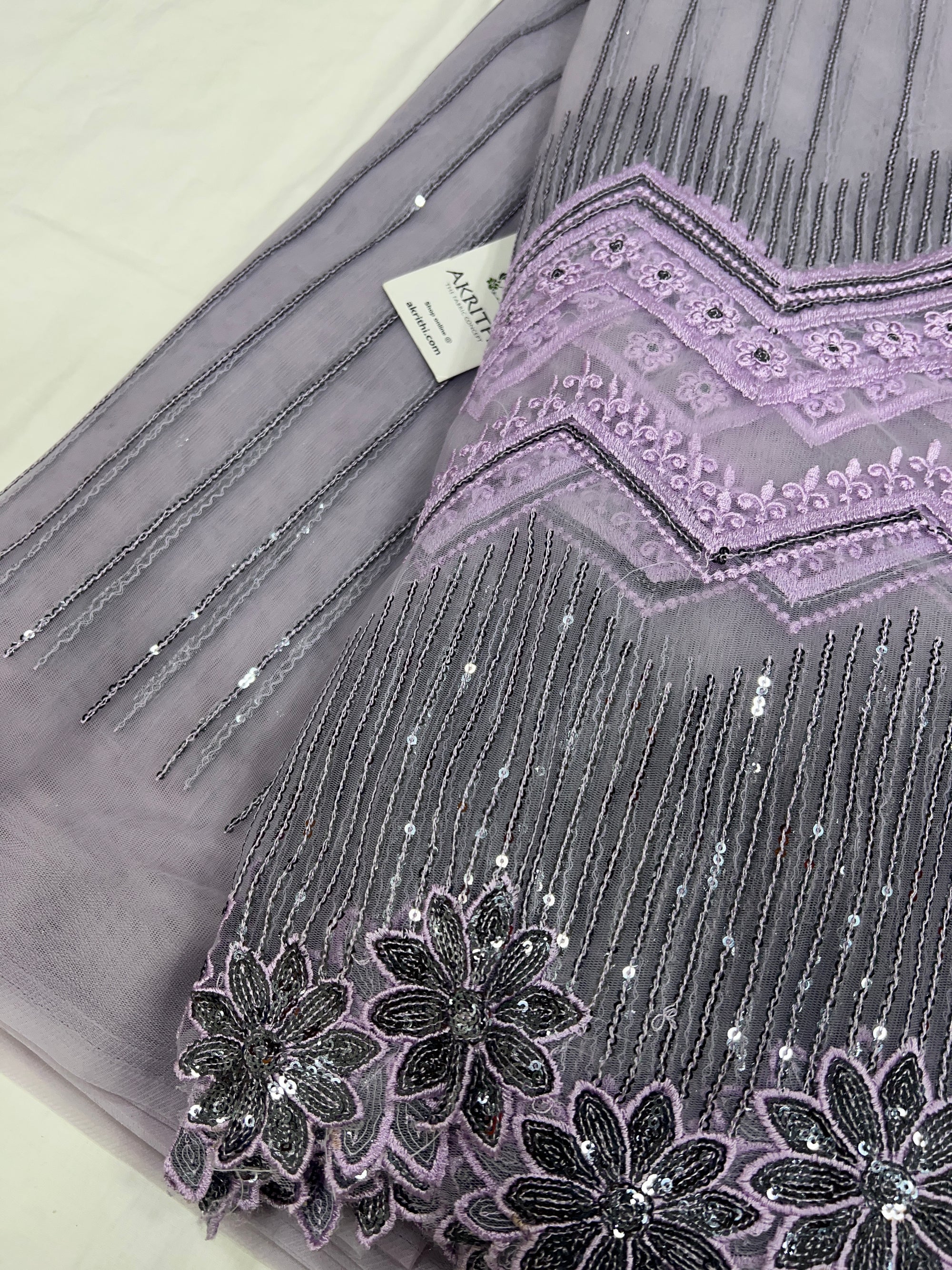 Embroidered net fabric