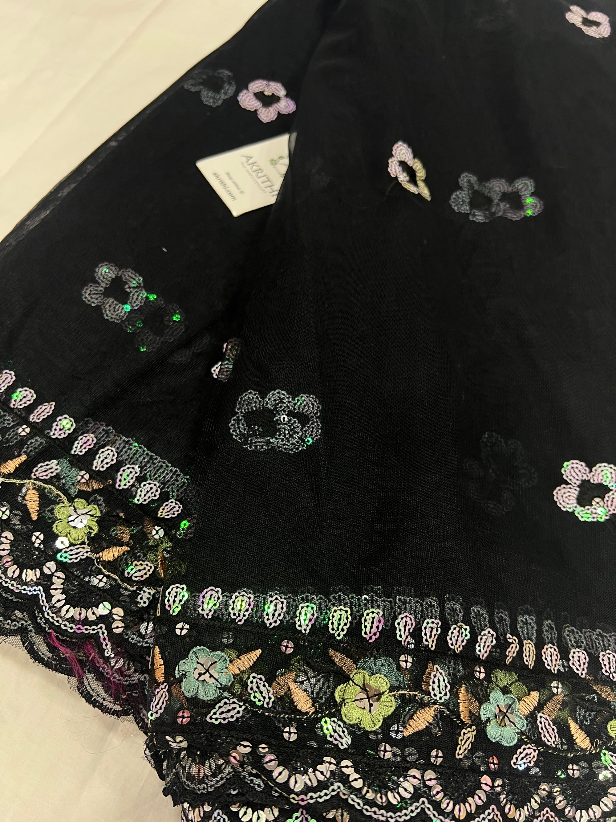 Embroidered net fabric