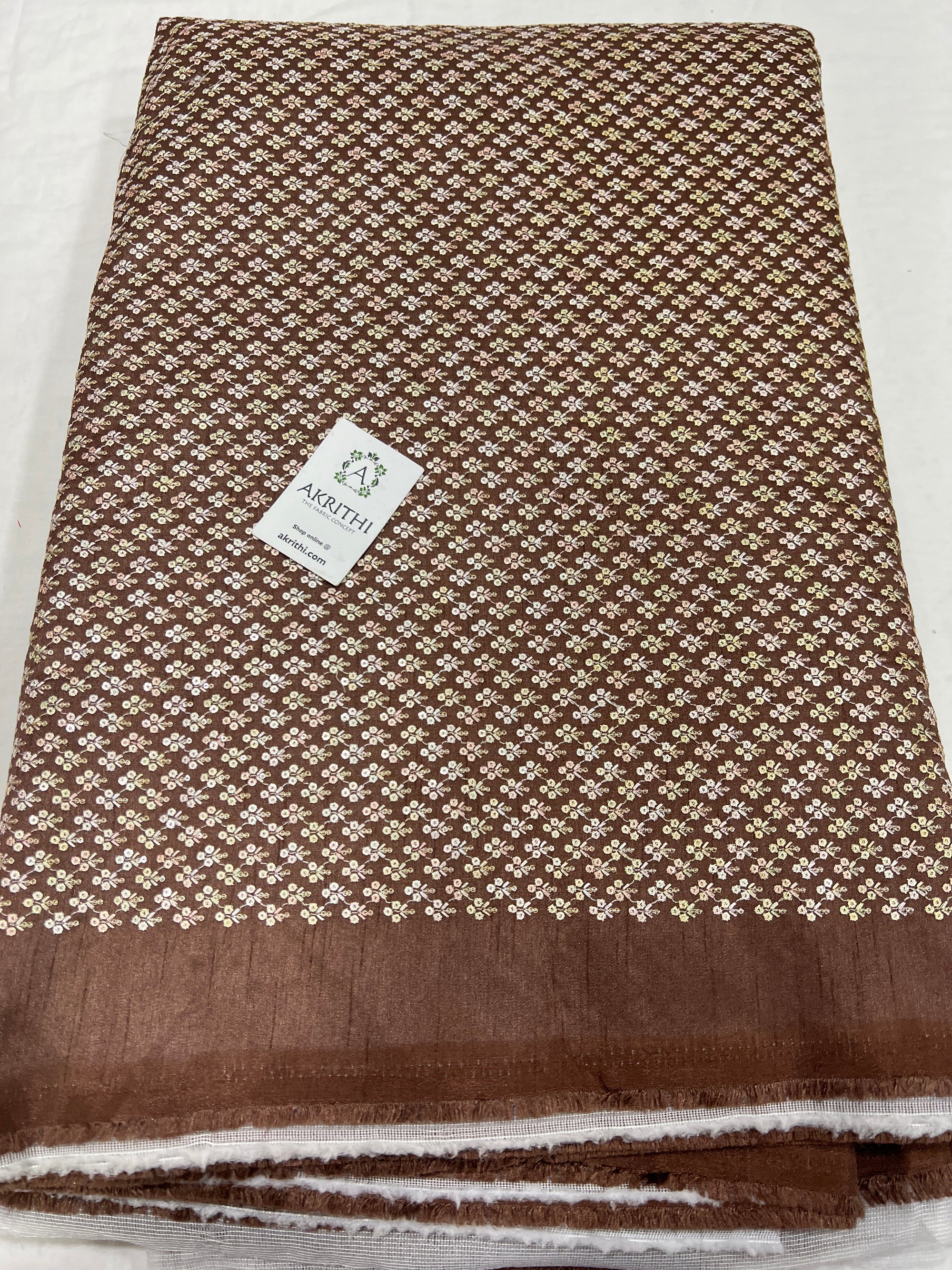 Embroidered raw silk fabric