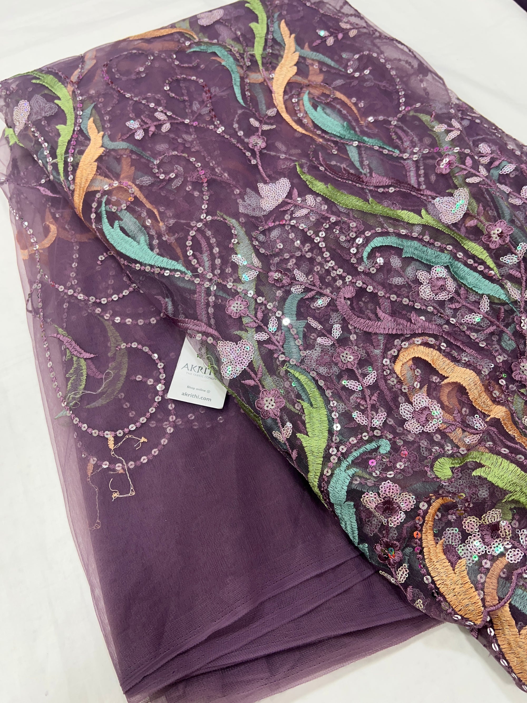 Embroidered net fabric