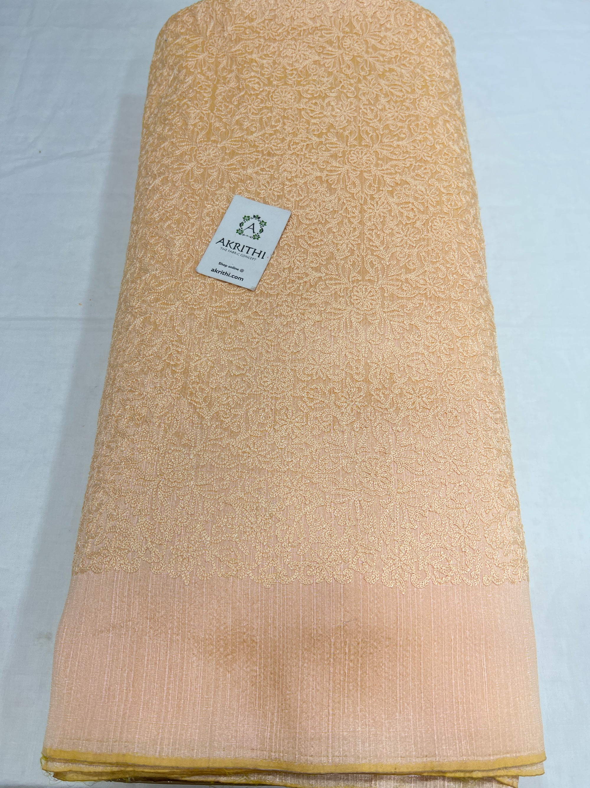 Embroidered raw silk fabric