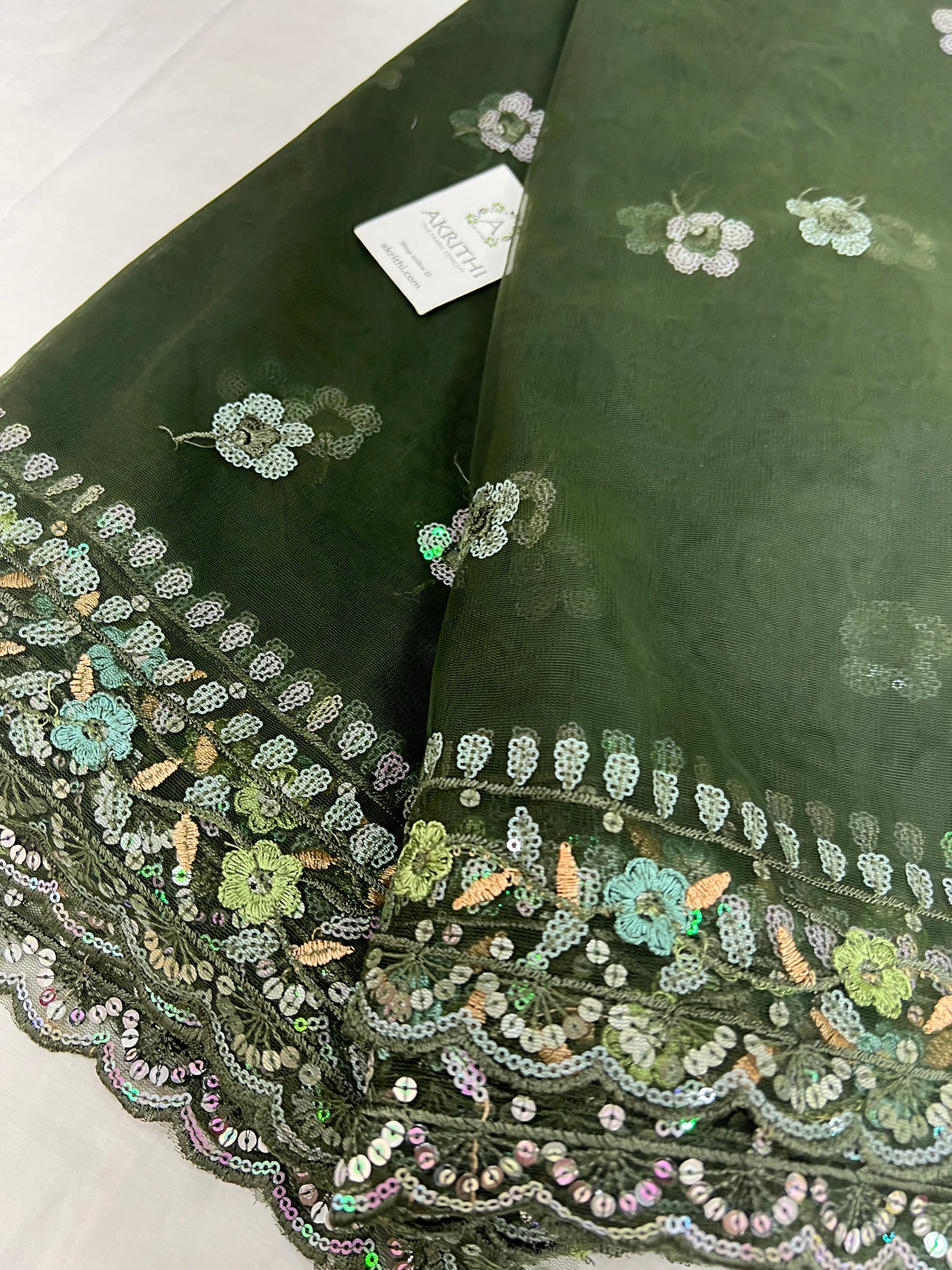 Embroidered net fabric