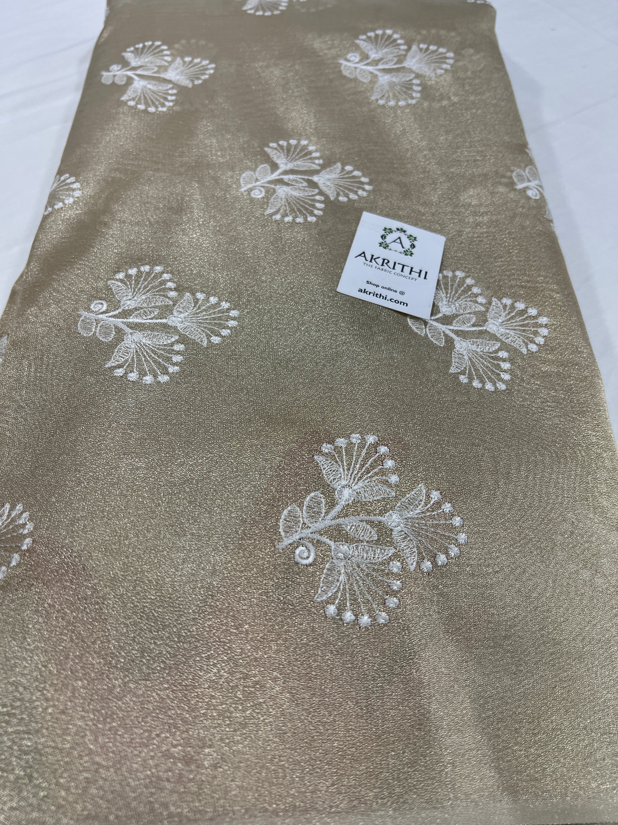 Embroidery on tissue fabric