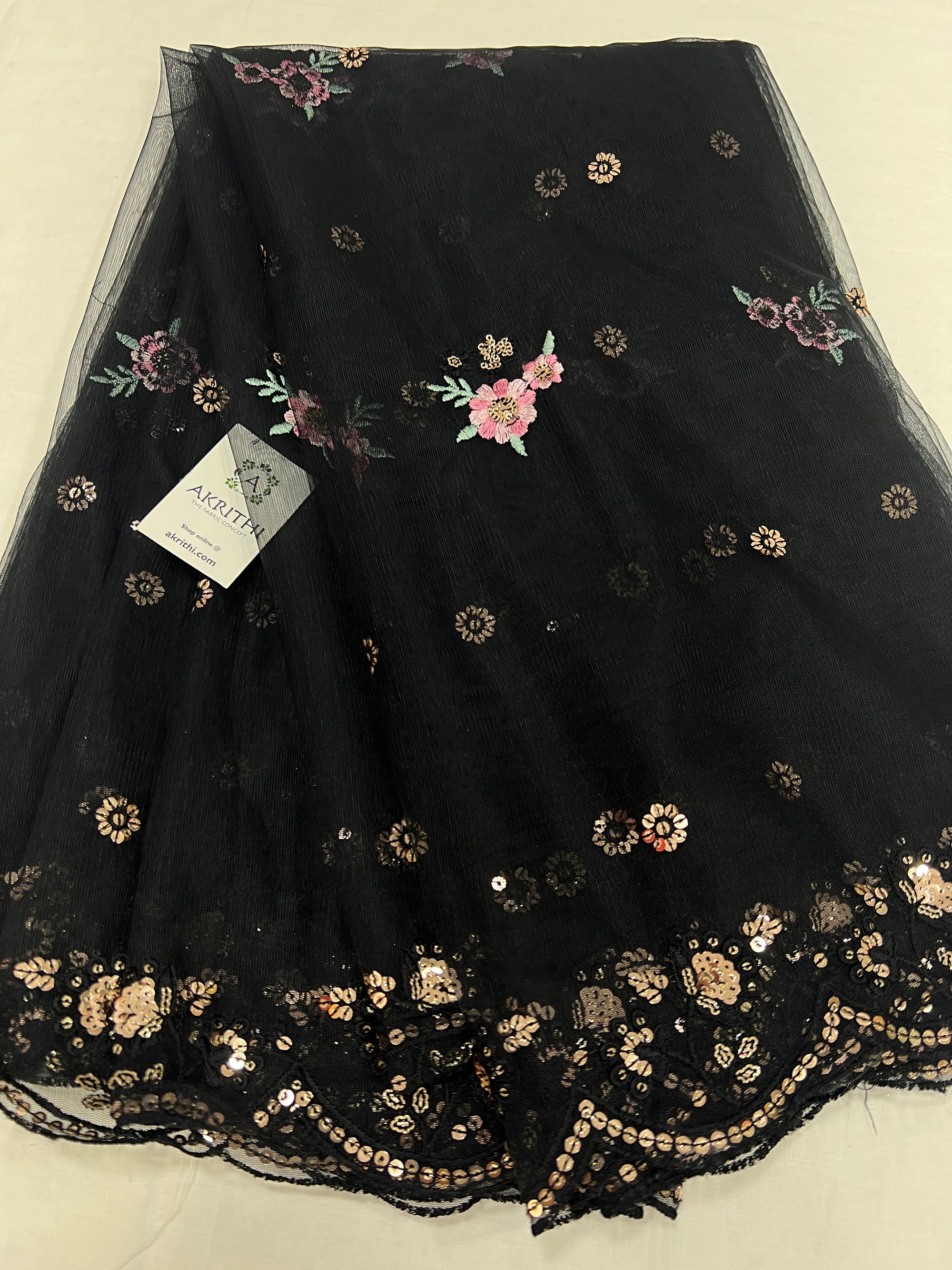 Embroidered net fabric