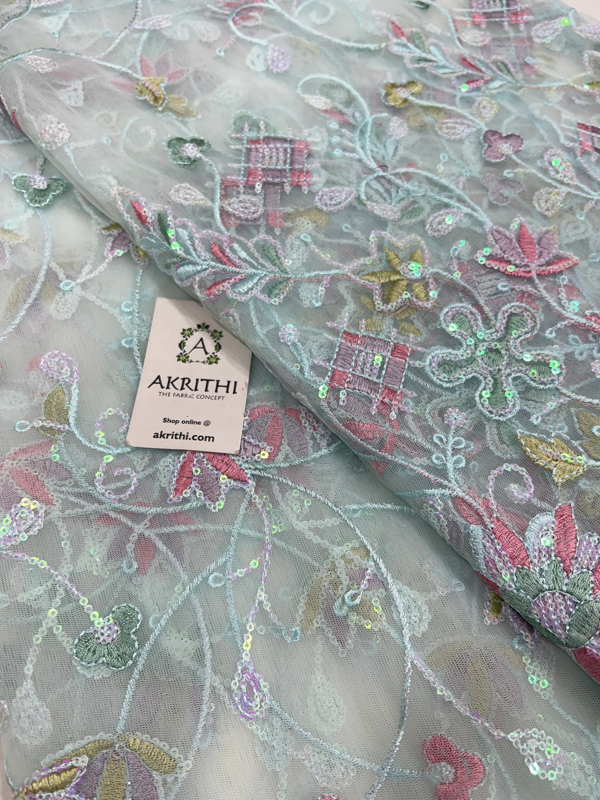 Embroidered net fabric