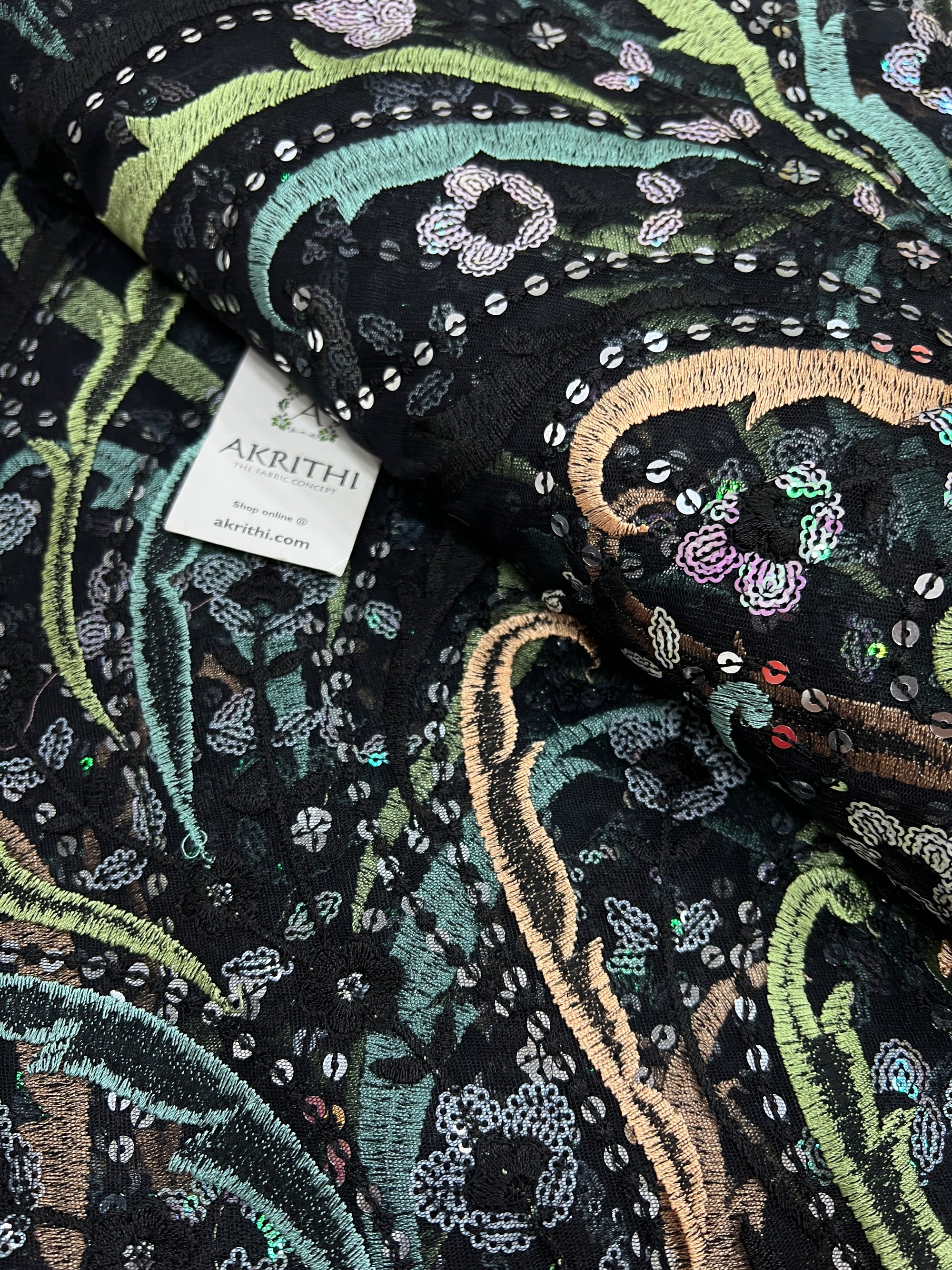 Embroidered net fabric