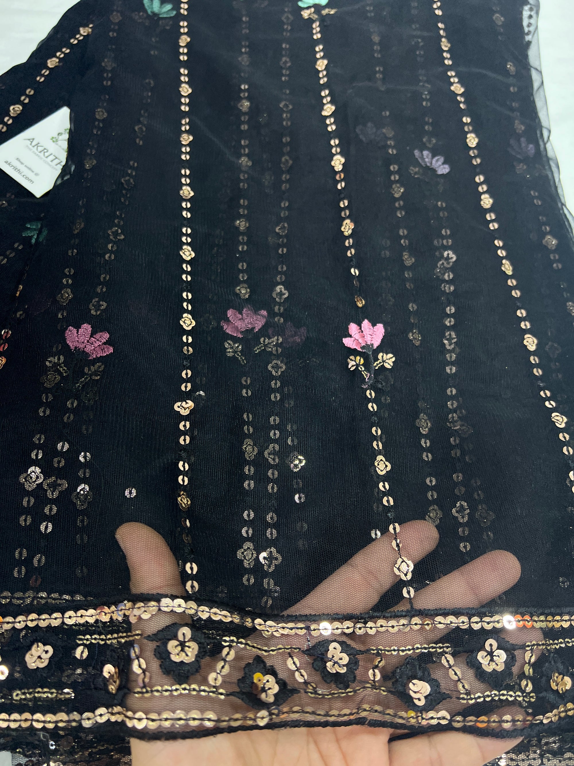 Embroidered net fabric