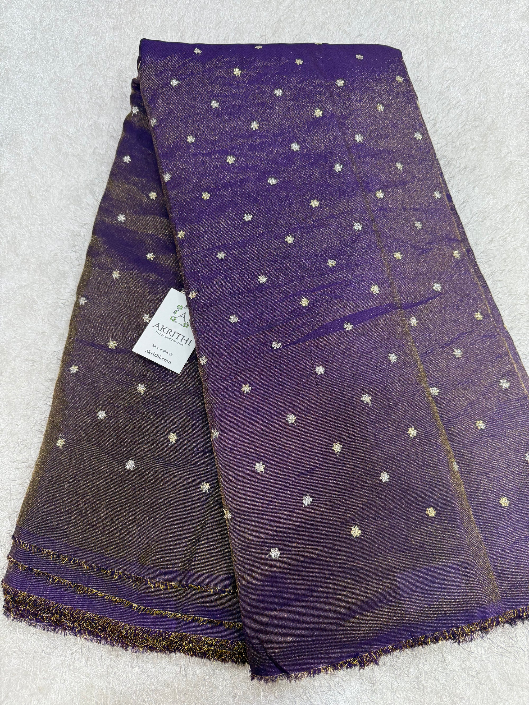 Sequins on tissue fabric