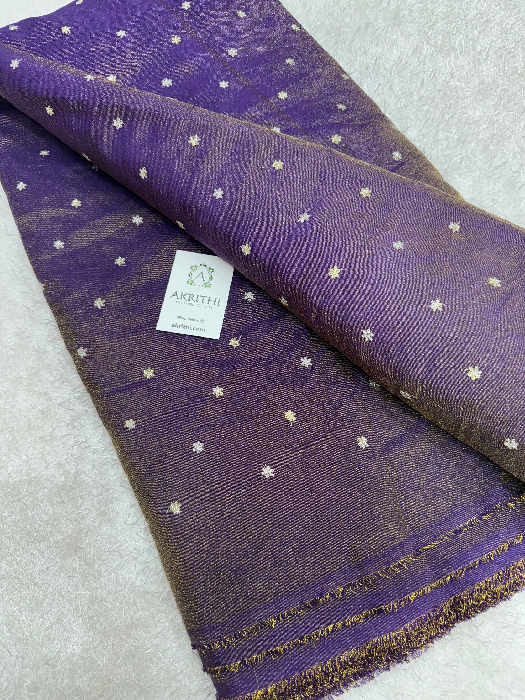 Sequins on tissue fabric