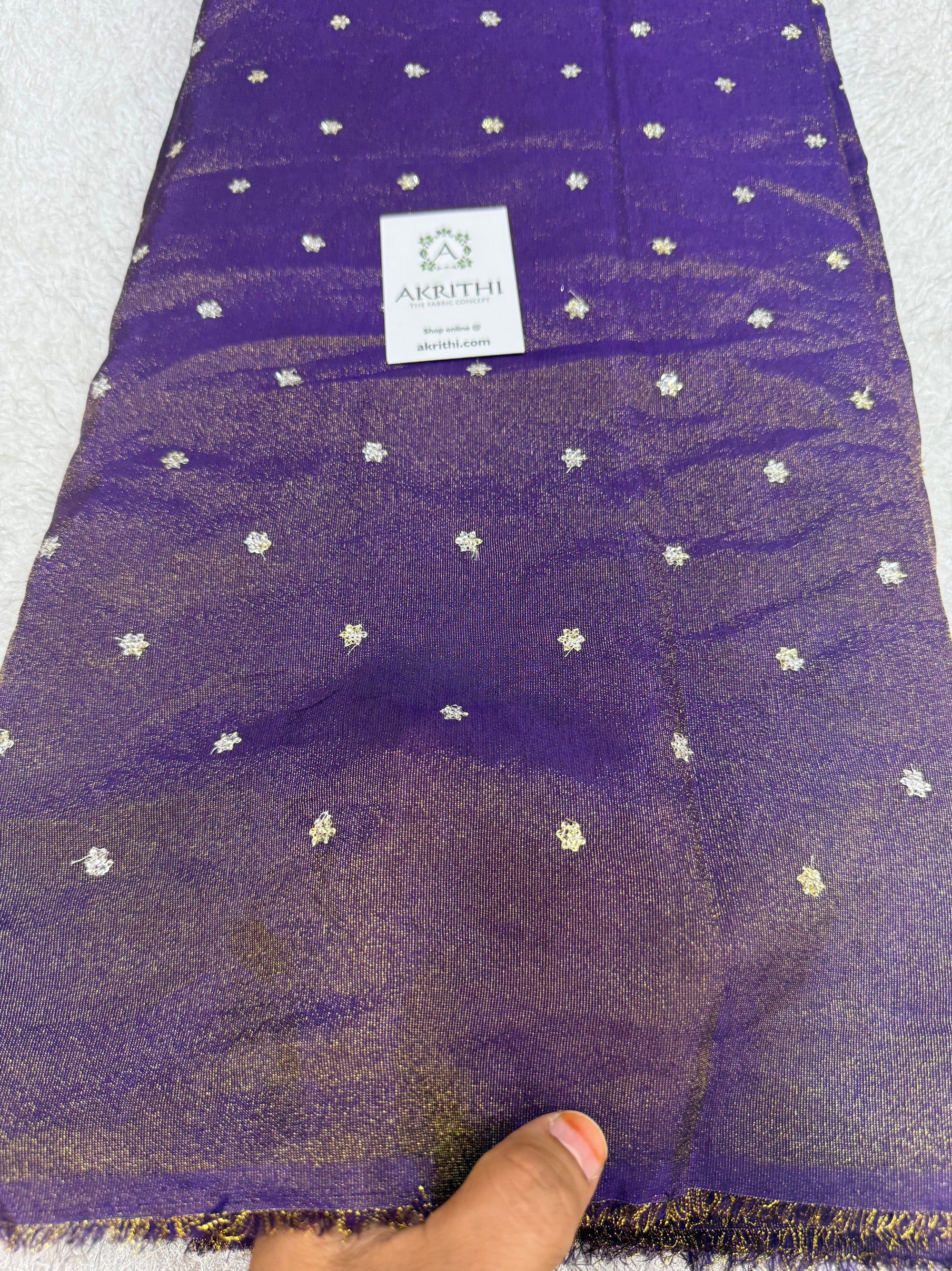Sequins on tissue fabric