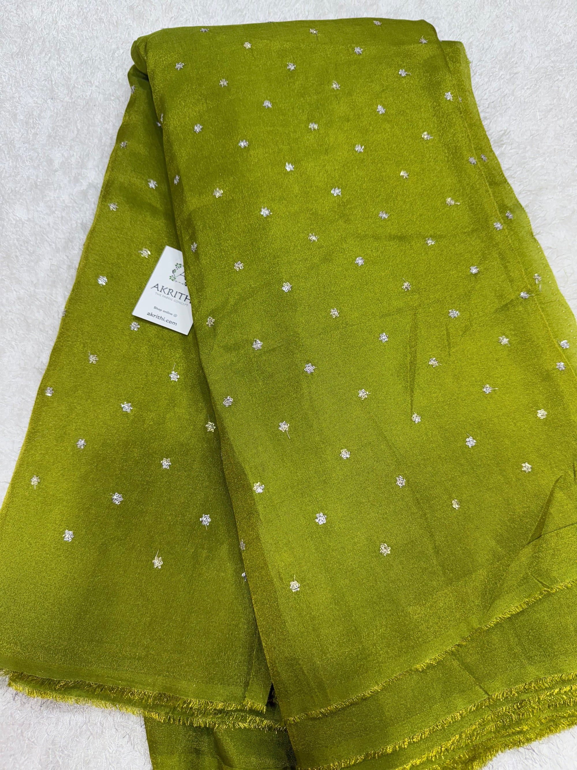 Sequins on tissue fabric