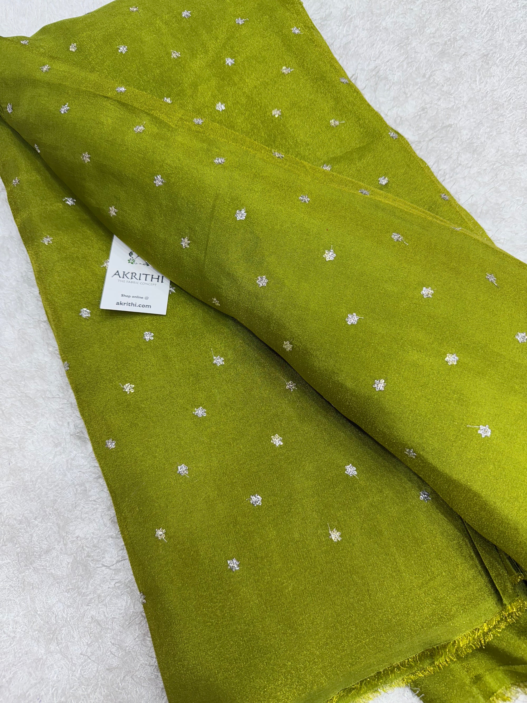 Sequins on tissue fabric