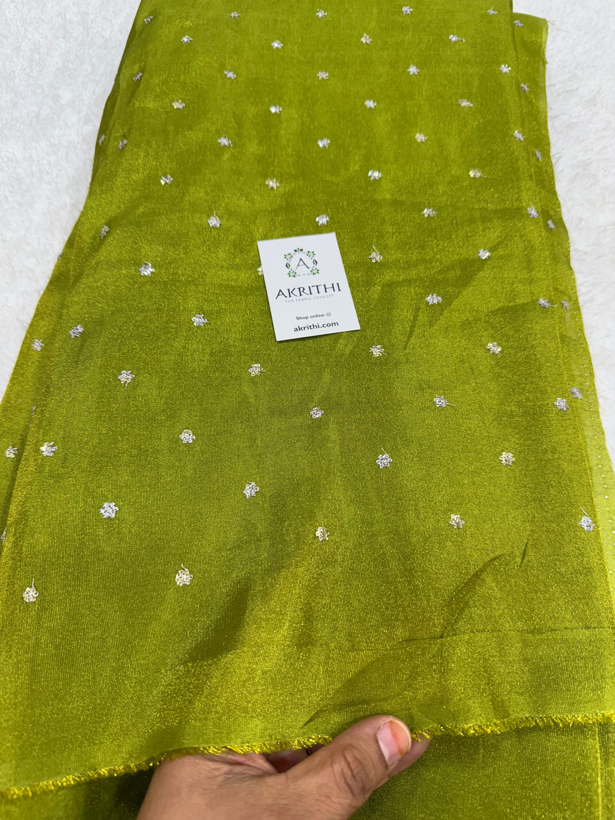 Sequins on tissue fabric