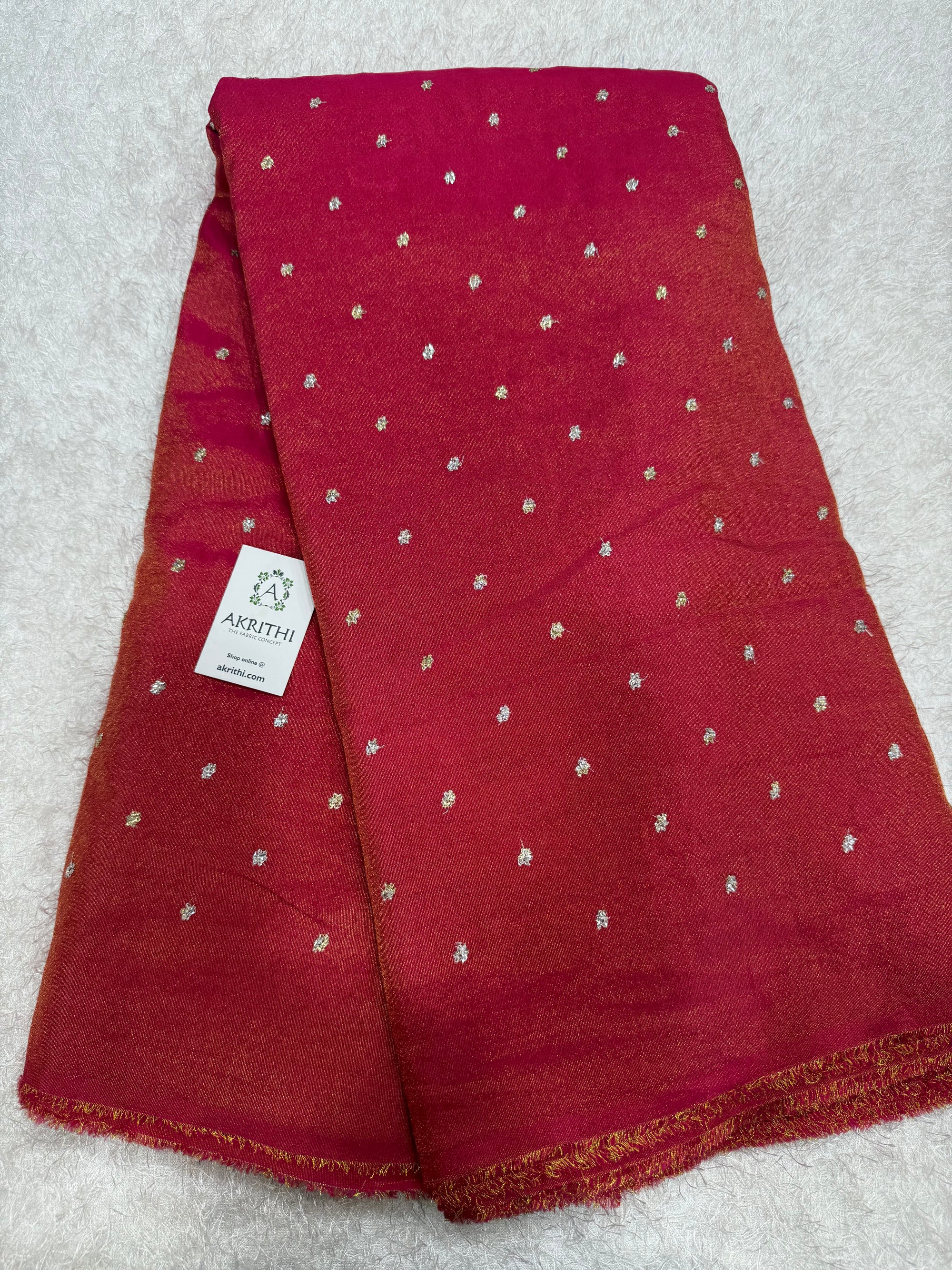 Sequins on tissue fabric