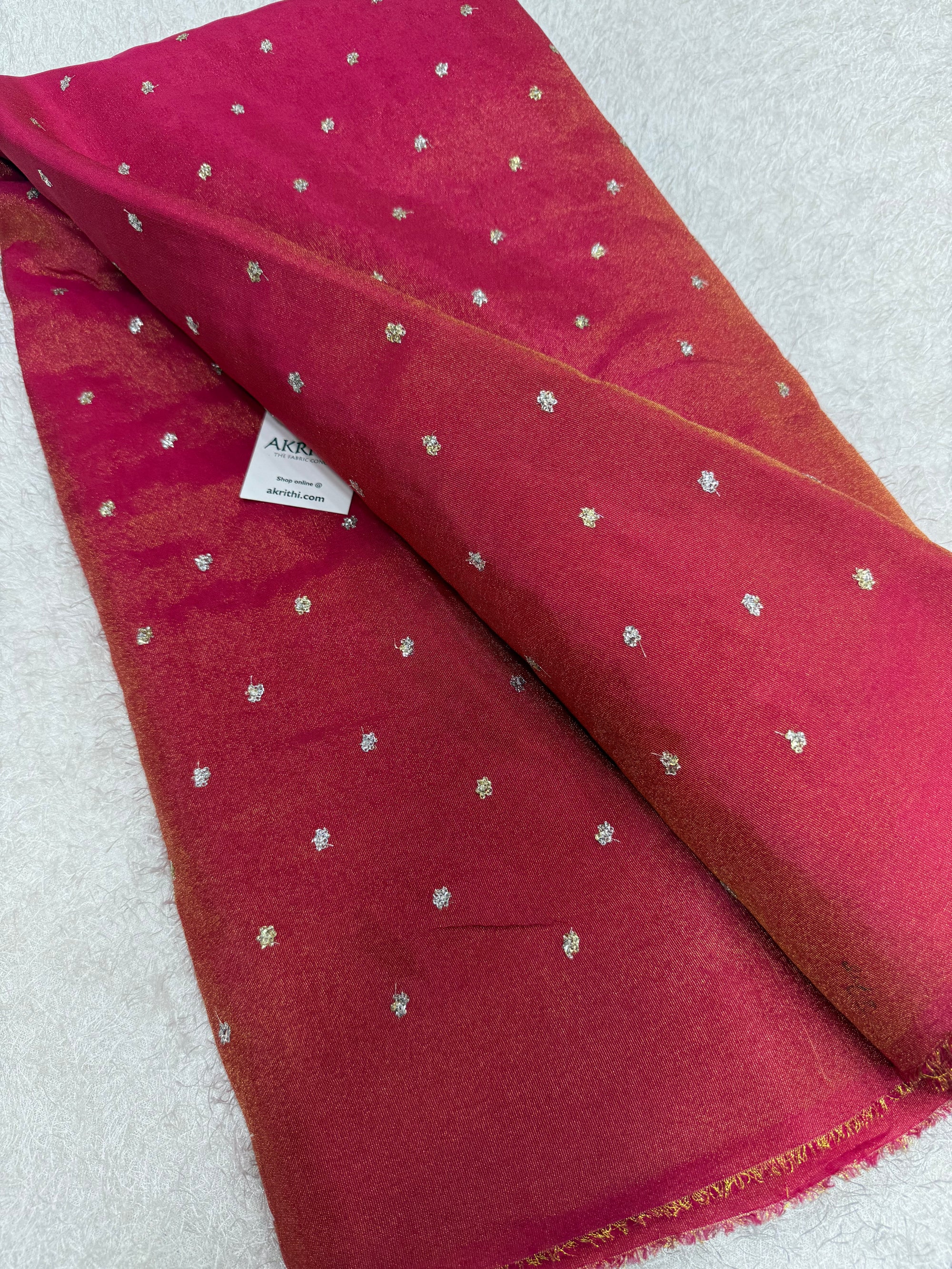 Sequins on tissue fabric