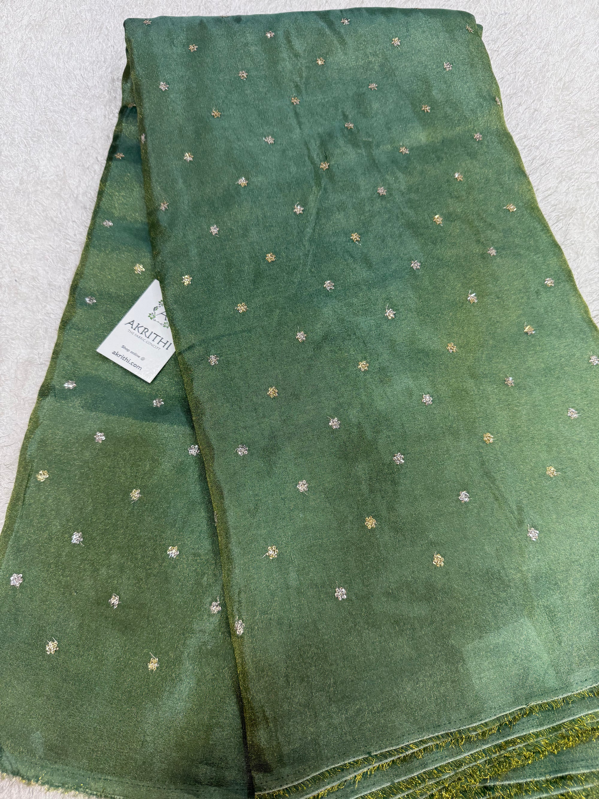 Sequins on tissue fabric