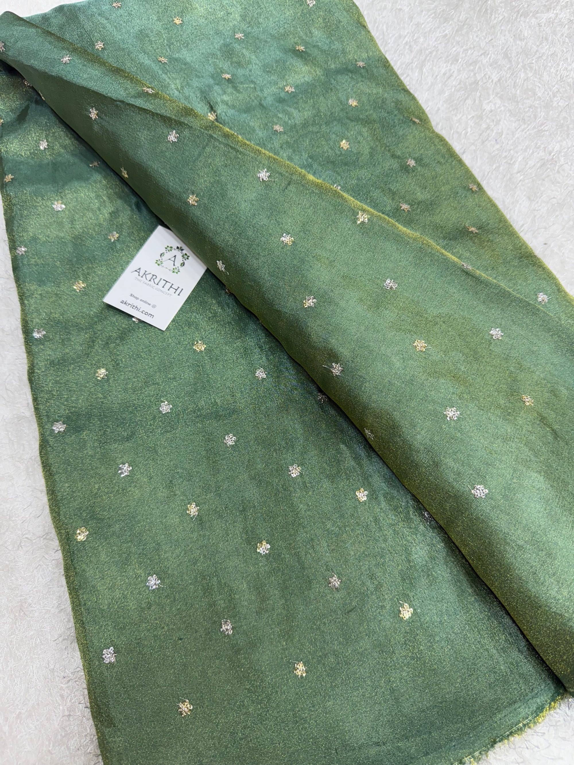 Sequins on tissue fabric