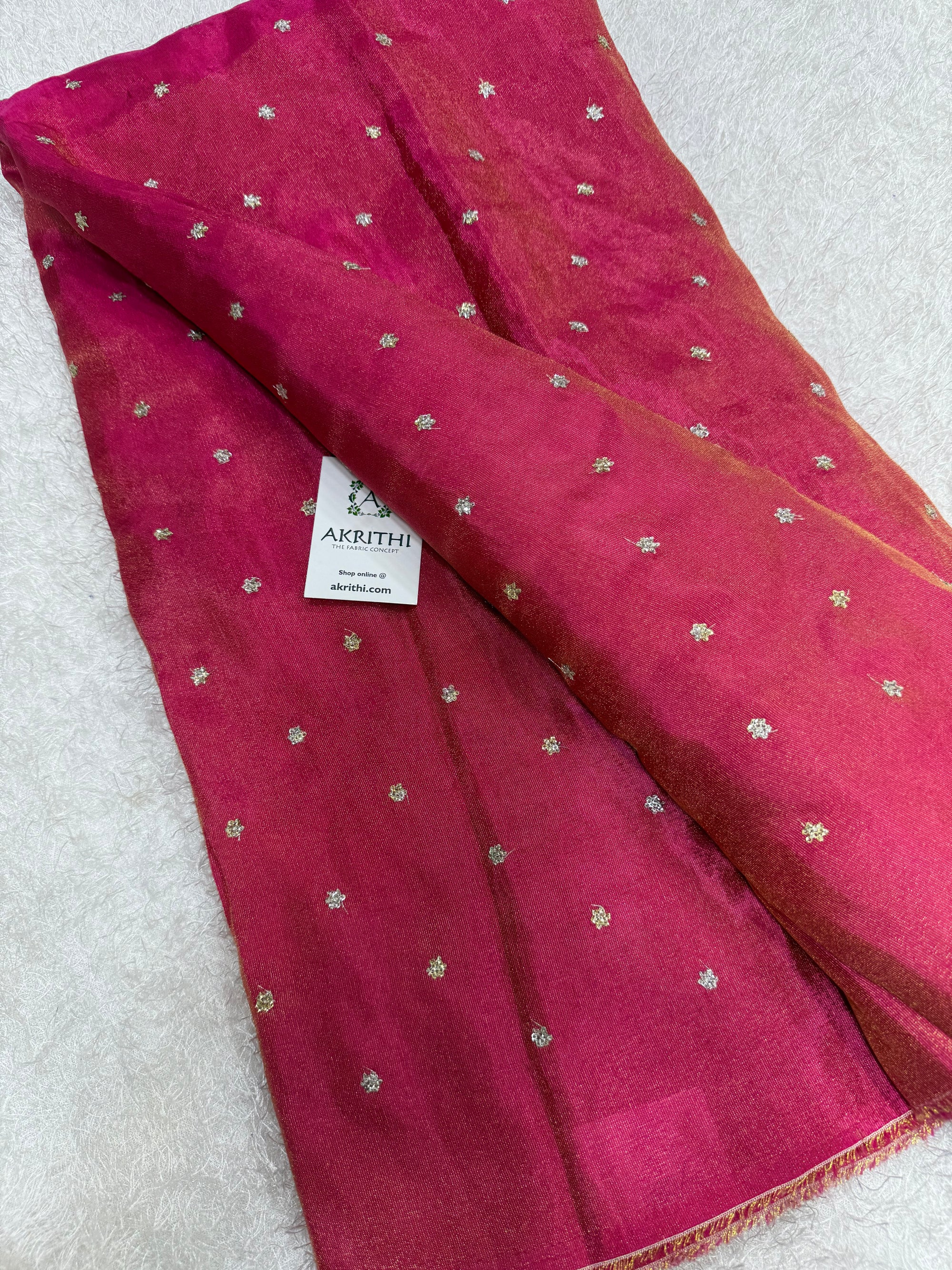 Sequins on tissue fabric