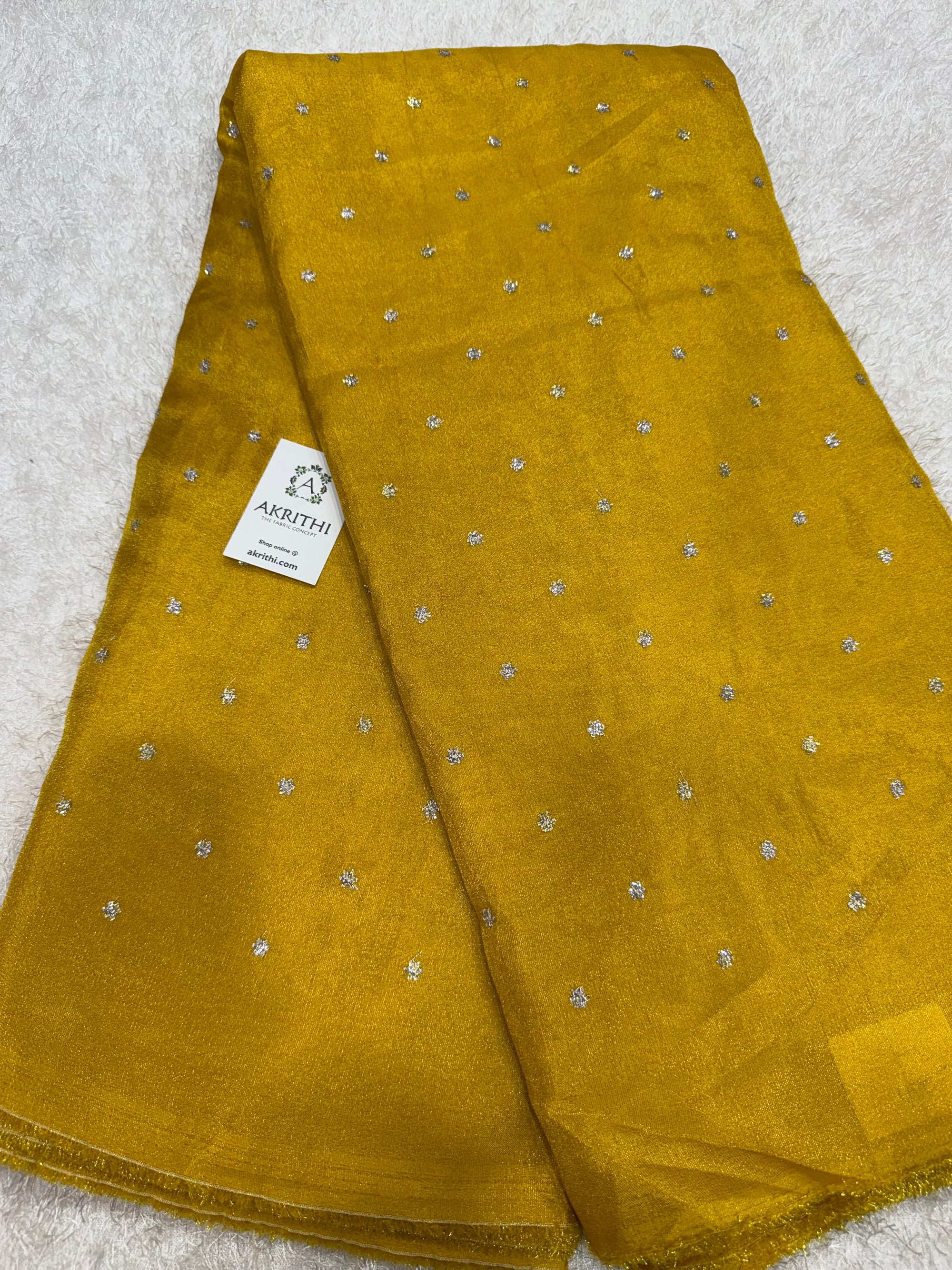 Sequins on tissue fabric