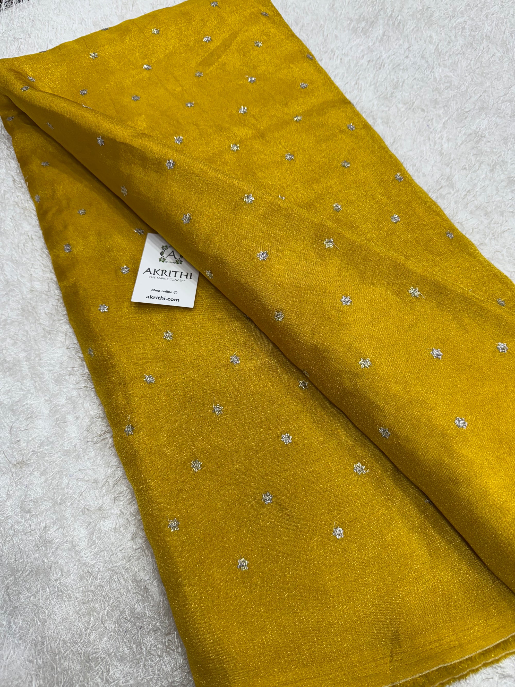 Sequins on tissue fabric