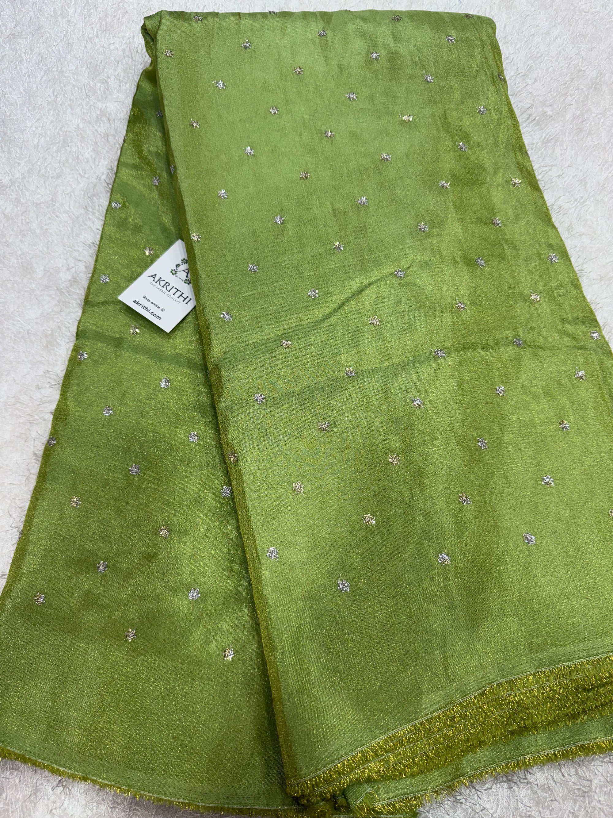 Sequins on tissue fabric