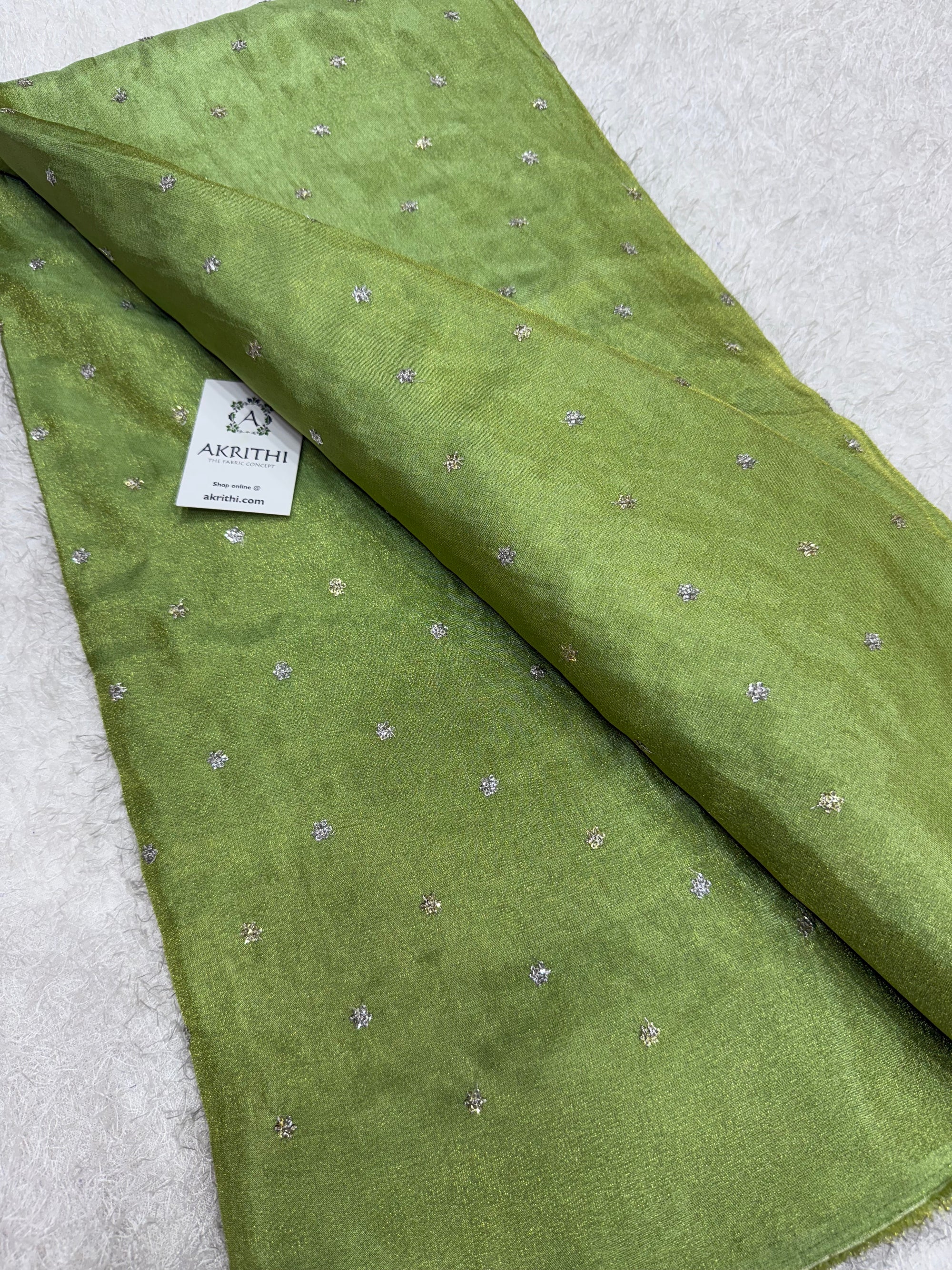 Sequins on tissue fabric