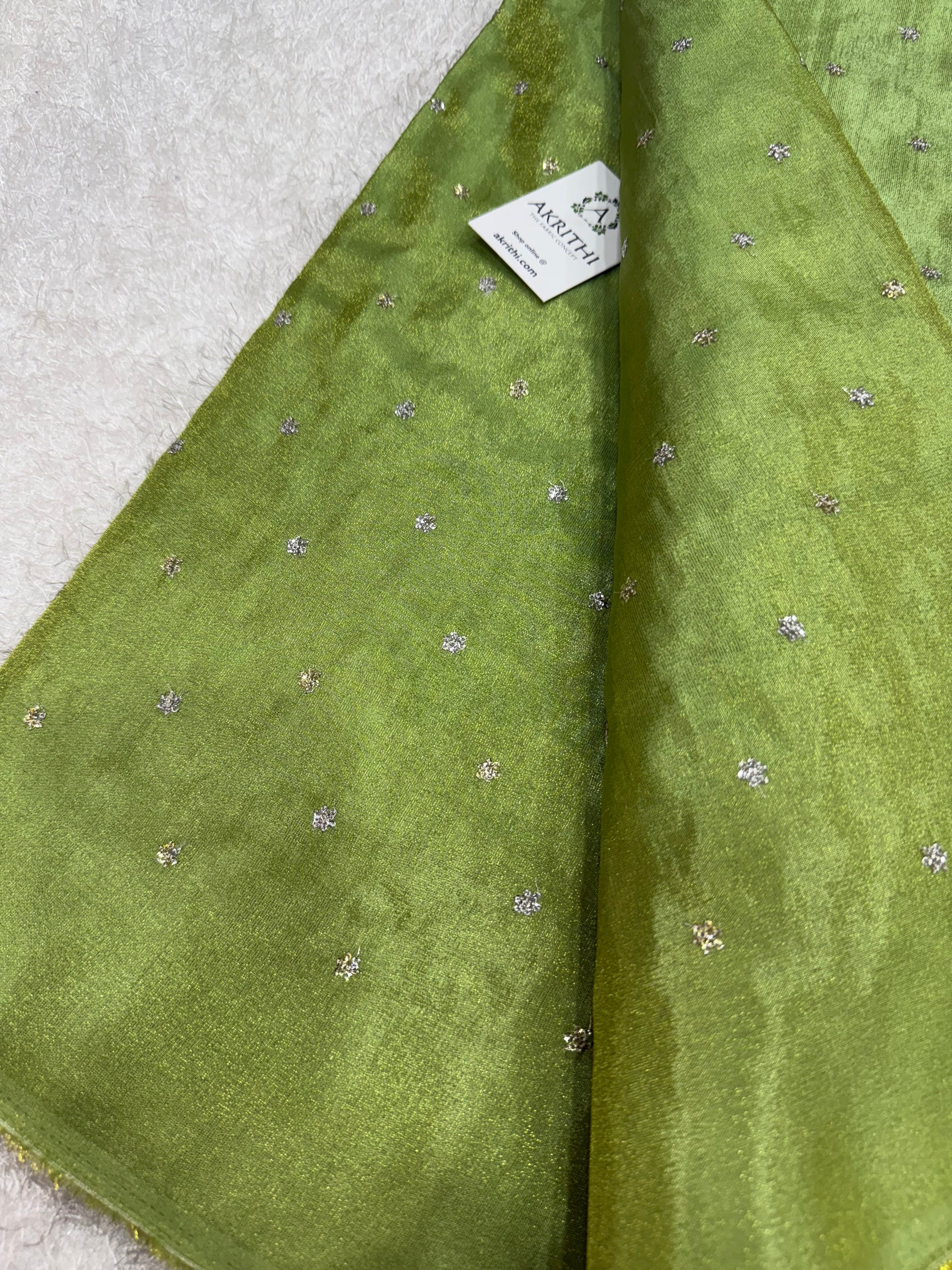 Sequins on tissue fabric